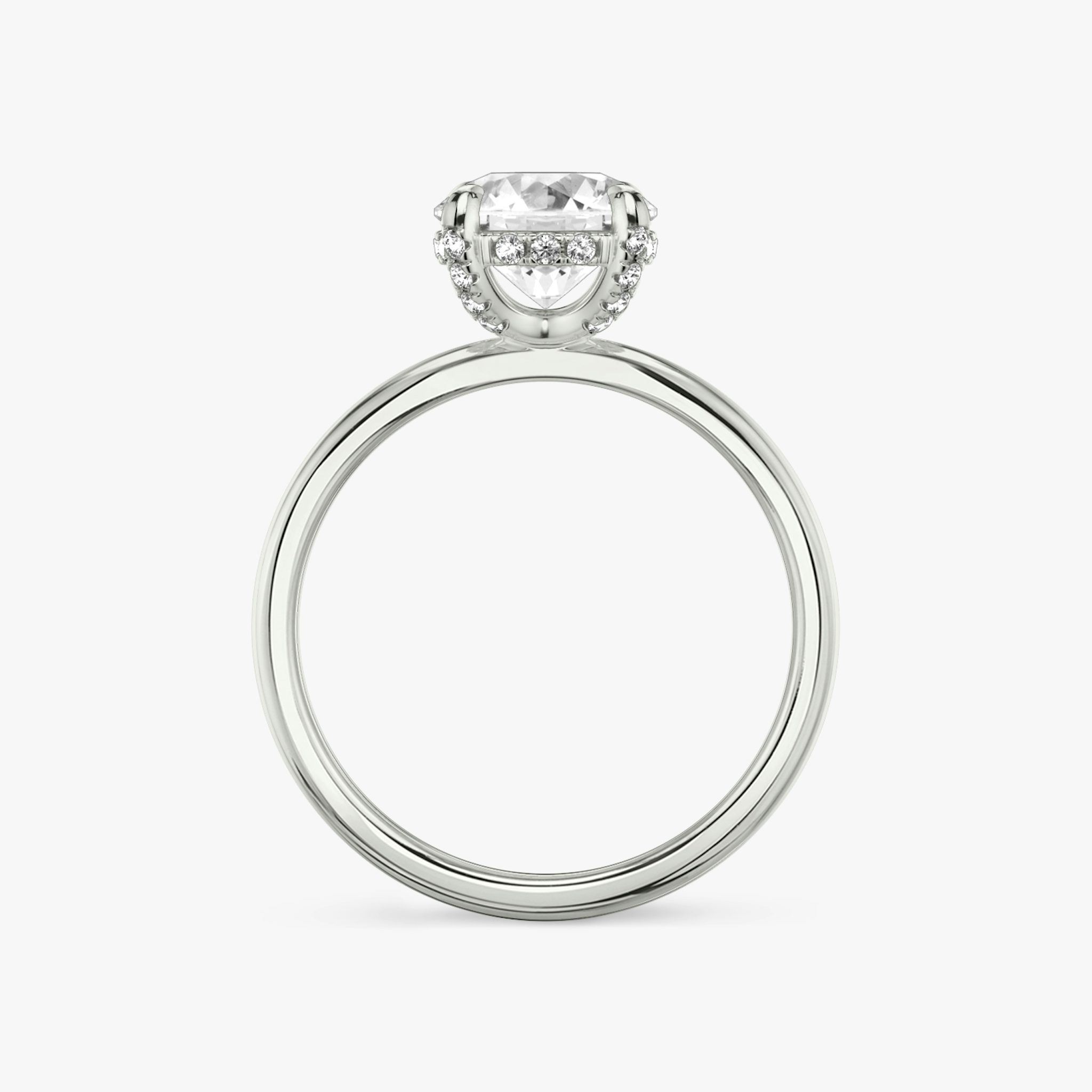 The Classic Hidden Halo | Round Brilliant | Platinum | bandAccent: Plain | bandWidth: standard | caratWeight: other | prongStyle: Pavé | diamondOrientation: vertical