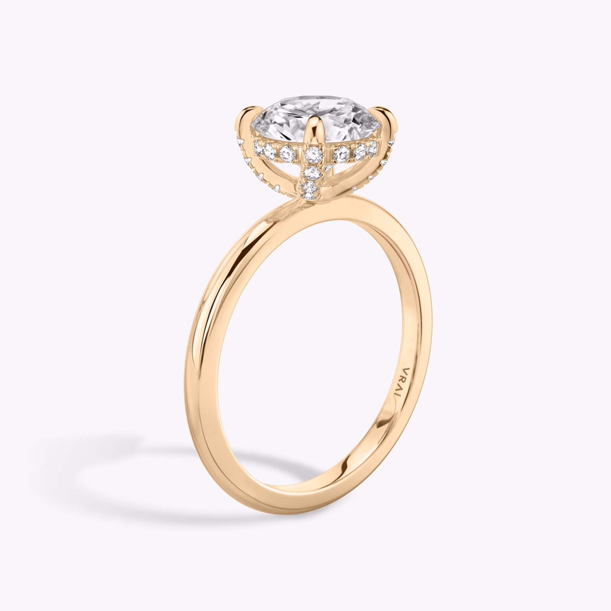 The Classic Hidden Halo | Round Brilliant | 14k | Rose Gold | bandAccent: Plain | bandWidth: standard | caratWeight: other | prongStyle: Pavé | diamondOrientation: vertical