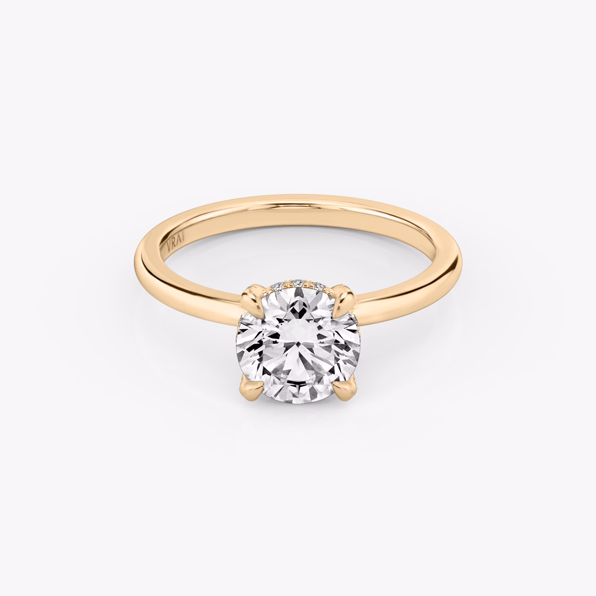 The Classic Hidden Halo | Round Brilliant | 14k | Rose Gold | bandAccent: Plain | bandWidth: standard | caratWeight: other | prongStyle: Pavé | diamondOrientation: vertical