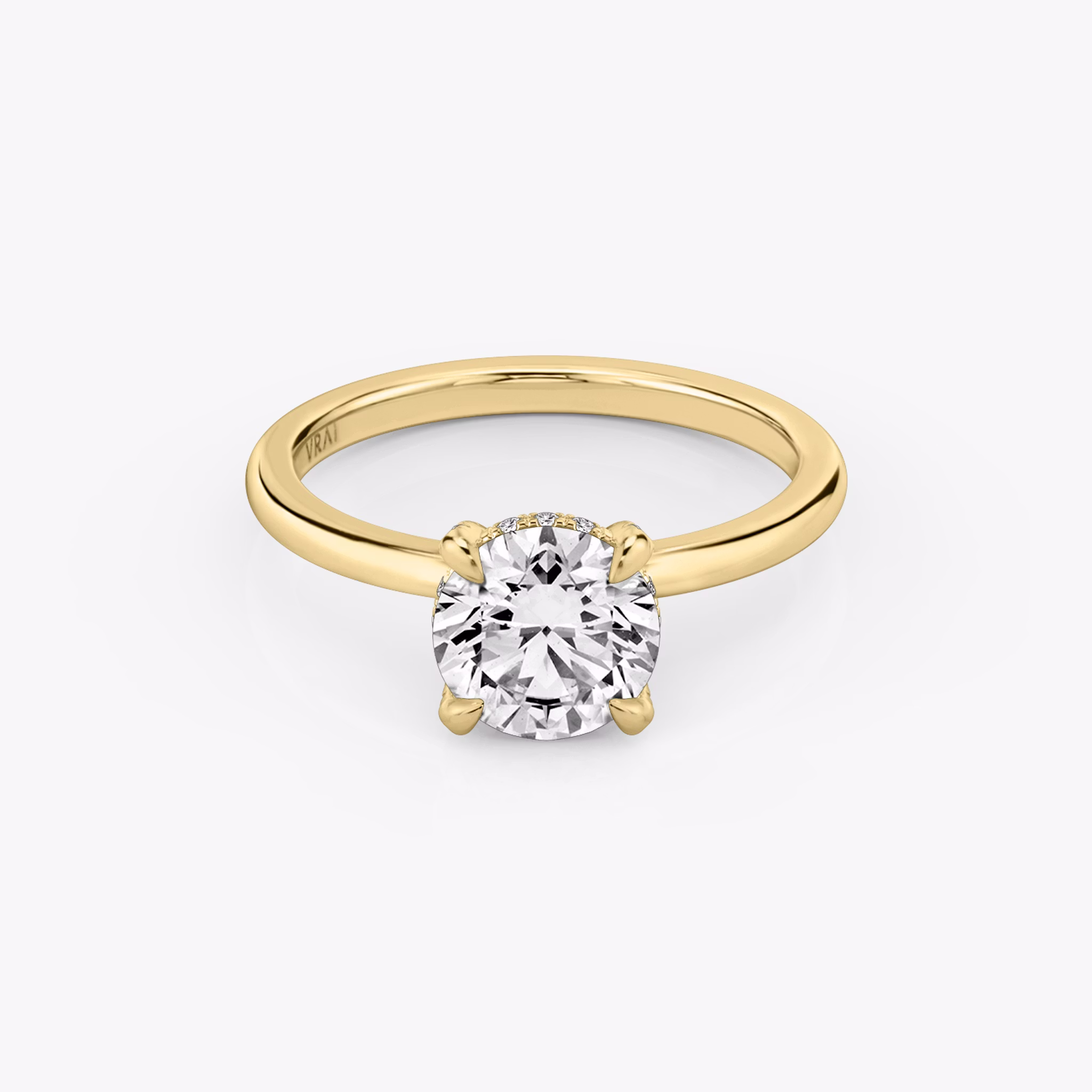Classic Hidden Halo | Rund | 18k | Gelbgold | bandAccent: Ohne Pavé-Besatz | bandWidth: standard | caratWeight: 1.0ct | prongStyle: Mit Pavé-Besatz | diamondOrientation: vertical