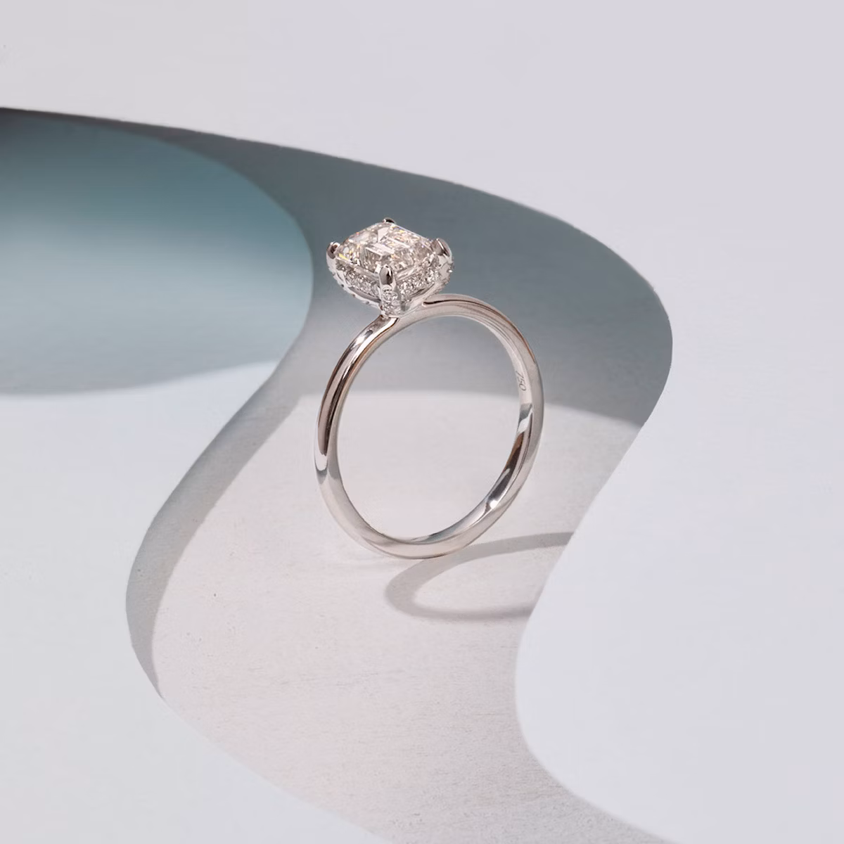 The Classic Hidden Halo | Emerald | 18k | White Gold | bandAccent: Plain | bandWidth: standard | prongStyle: Pavé | diamondOrientation: vertical | caratWeight: other