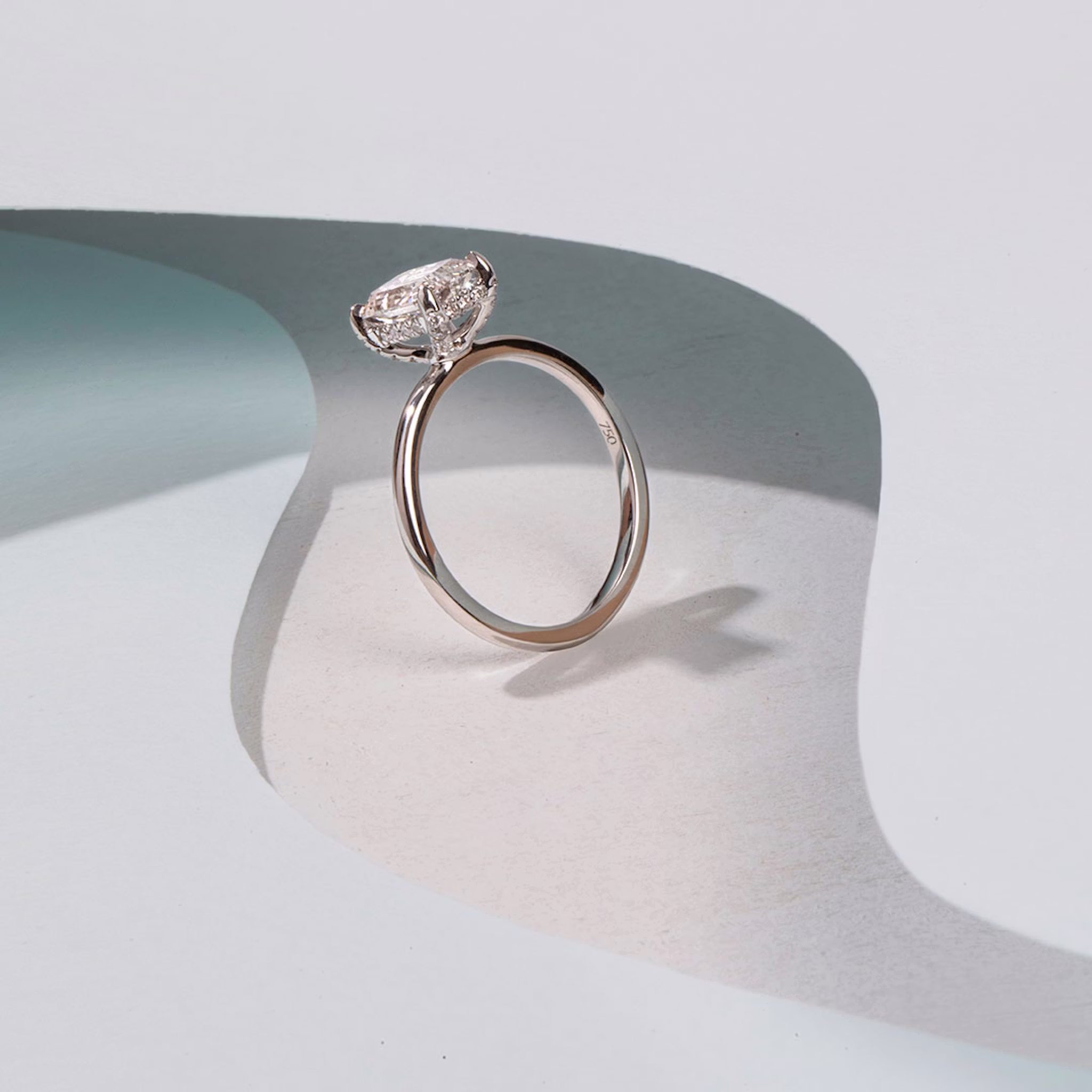 The Classic Hidden Halo | Radiant | Platinum | bandAccent: Plain | bandWidth: standard | prongStyle: Pavé | diamondOrientation: vertical | caratWeight: other