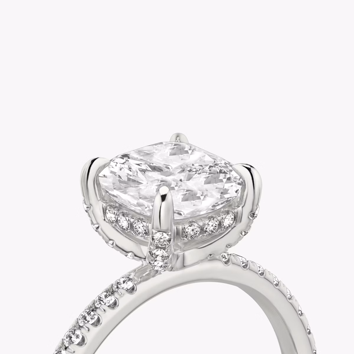 The Classic Hidden Halo | Cushion | Platinum | bandAccent: Pavé | bandWidth: standard | prongStyle: Pavé | diamondOrientation: vertical | caratWeight: other