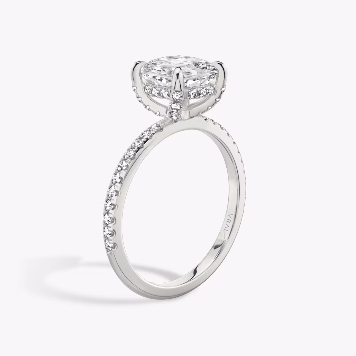 The Classic Hidden Halo | Cushion | Platinum | bandAccent: Pavé | bandWidth: standard | prongStyle: Pavé | diamondOrientation: vertical | caratWeight: other
