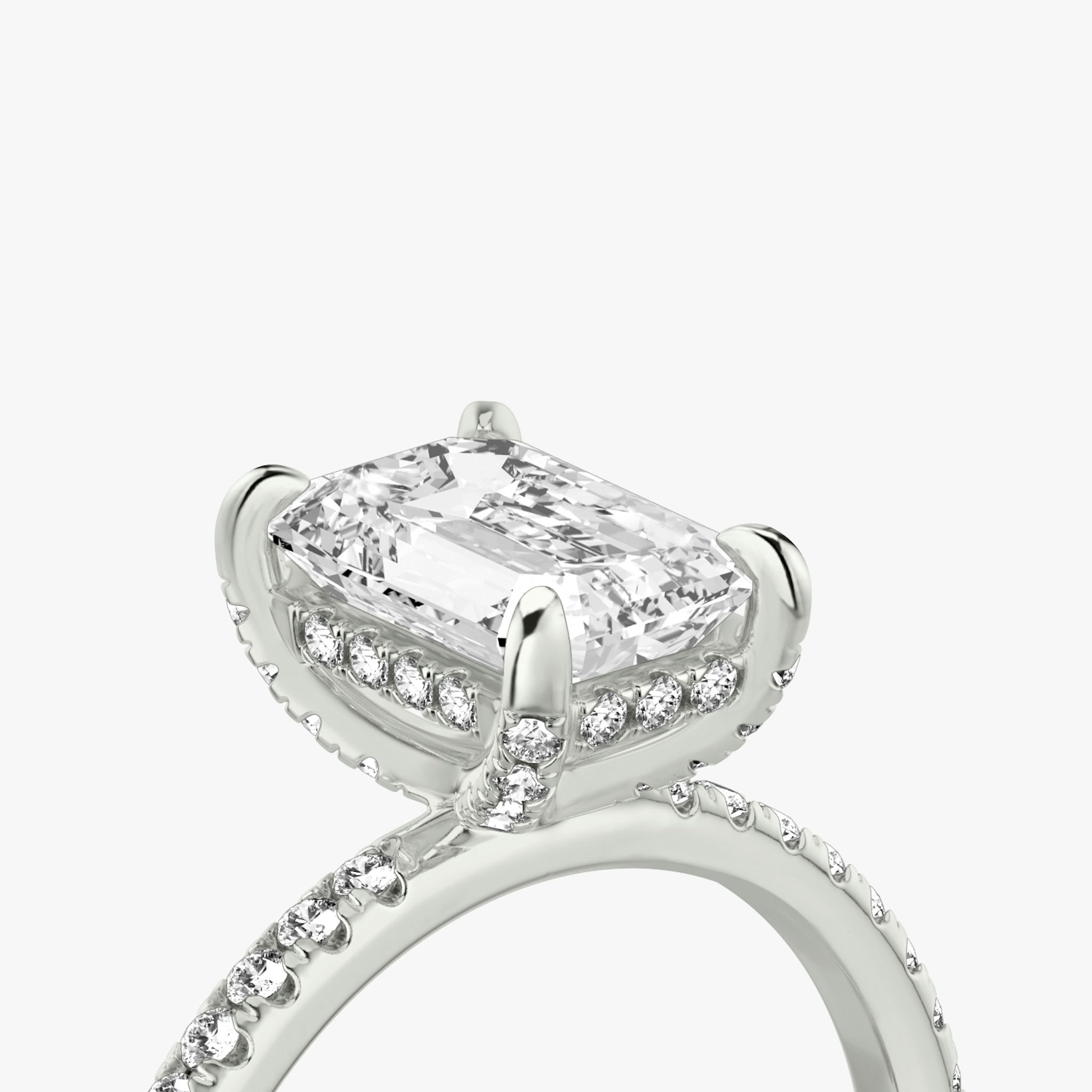 The Classic Hidden Halo | Emerald | 18k | White Gold | bandAccent: Pavé | bandWidth: standard | prongStyle: Pavé | diamondOrientation: vertical | caratWeight: other