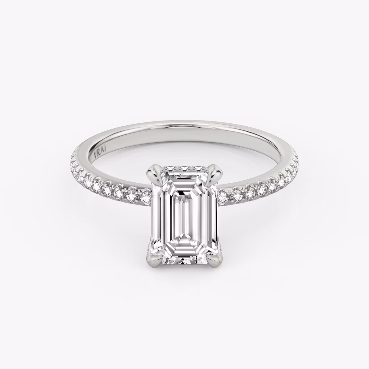 The Classic Hidden Halo | Emerald | 18k | White Gold | bandAccent: Pavé | bandWidth: standard | prongStyle: Pavé | diamondOrientation: vertical | caratWeight: other