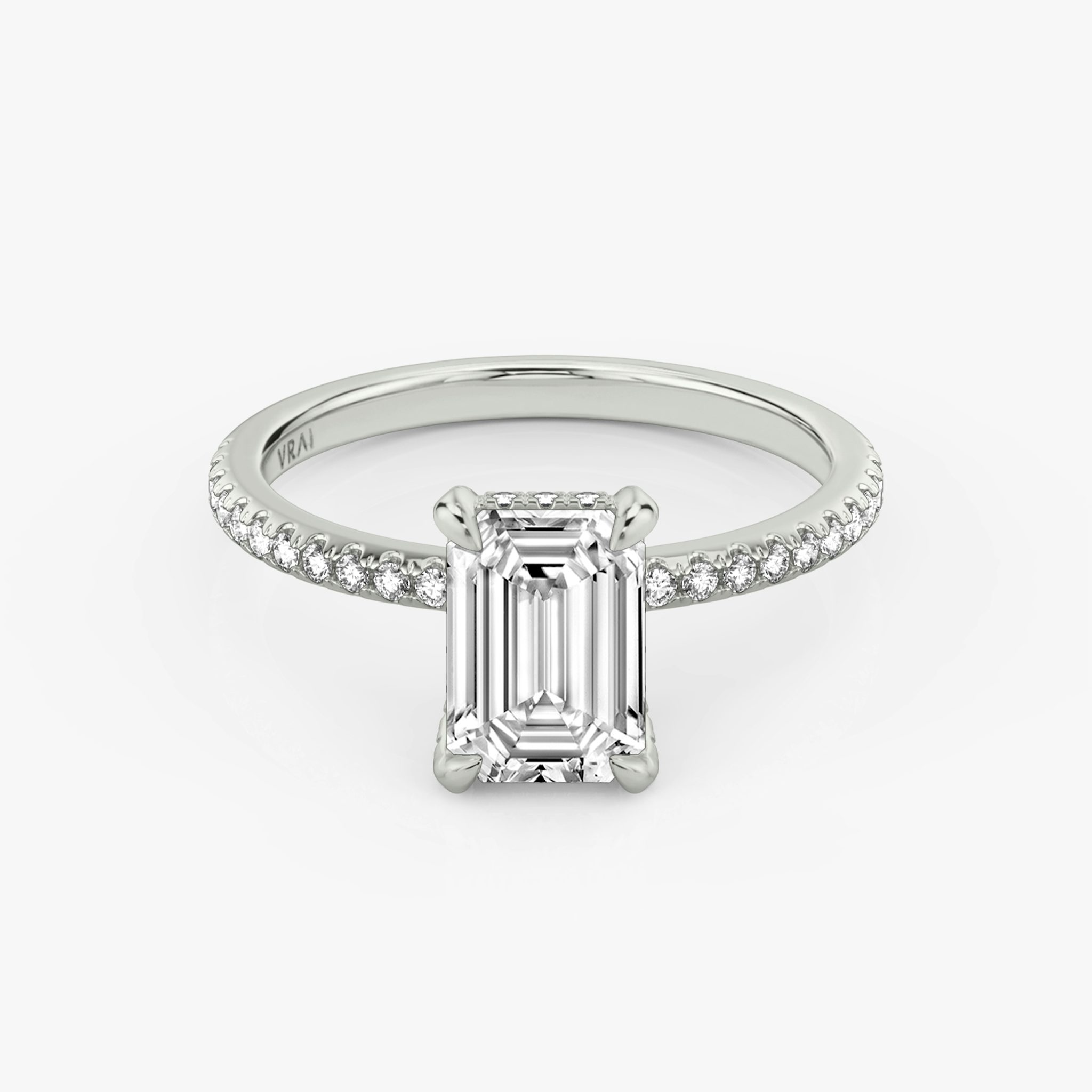 The Classic Hidden Halo | Emerald | 18k | White Gold | bandAccent: Pavé | bandWidth: standard | prongStyle: Pavé | diamondOrientation: vertical | caratWeight: other