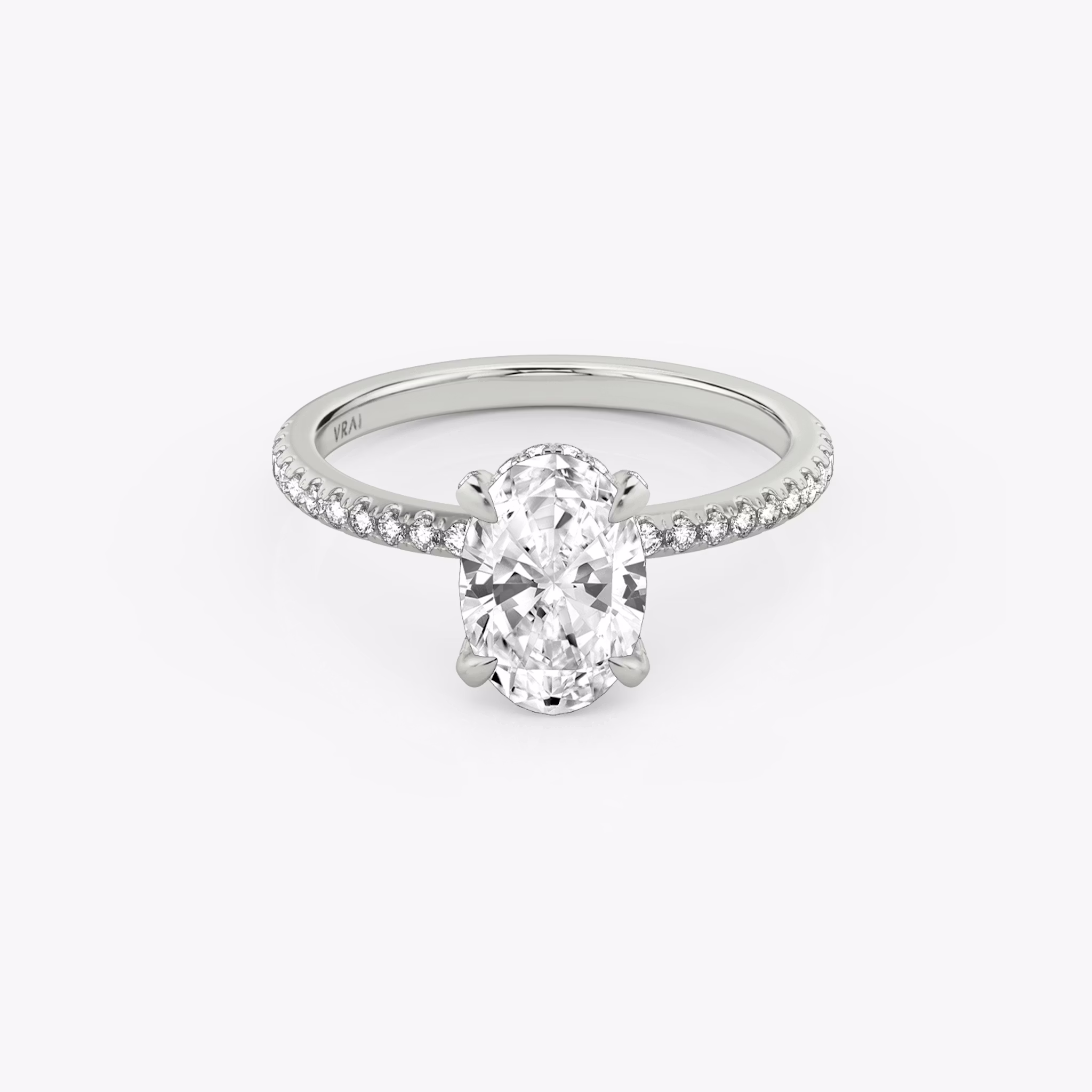 The Classic Hidden Halo | Oval | 18k | White Gold | bandAccent: Pavé | bandWidth: standard | prongStyle: Pavé | diamondOrientation: vertical | caratWeight: other