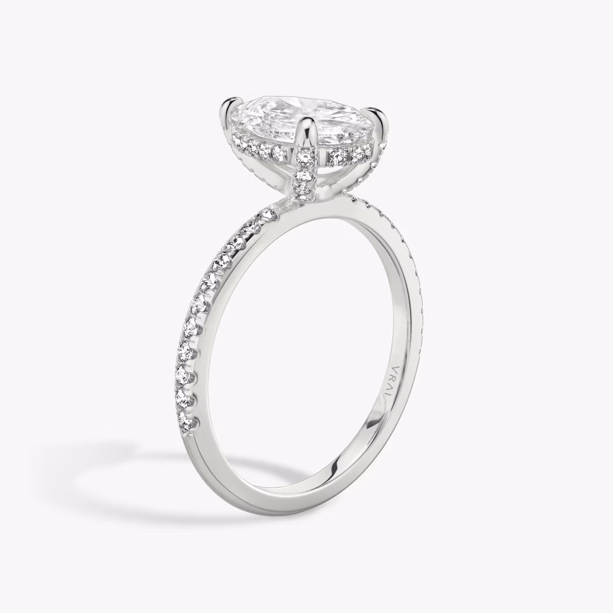 The Classic Hidden Halo | Pear | 18k | White Gold | bandAccent: Pavé | bandWidth: standard | prongStyle: Pavé | diamondOrientation: vertical | caratWeight: other