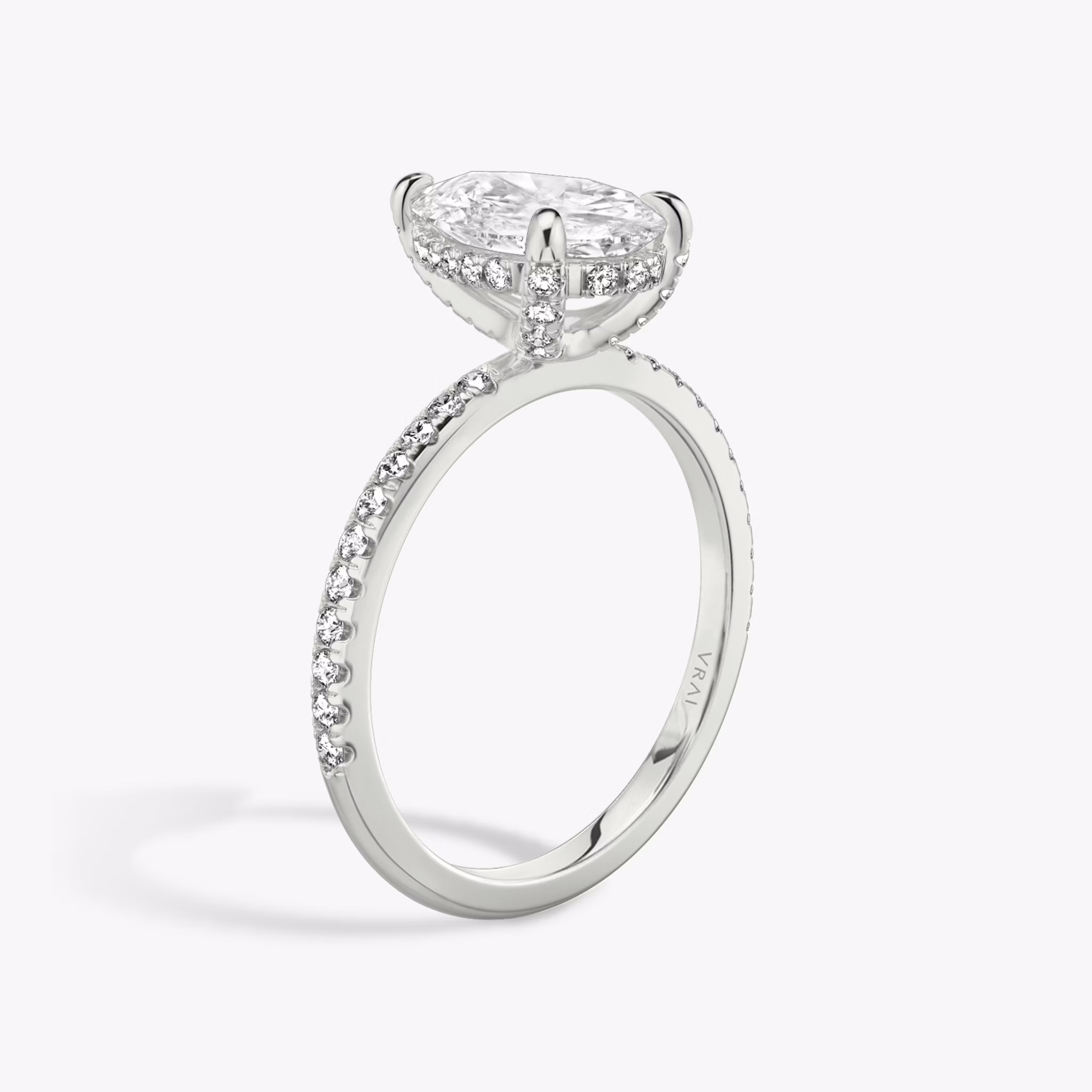 The Classic Hidden Halo | Pear | 18k | White Gold | bandAccent: Pavé | bandWidth: standard | prongStyle: Pavé | diamondOrientation: vertical | caratWeight: other