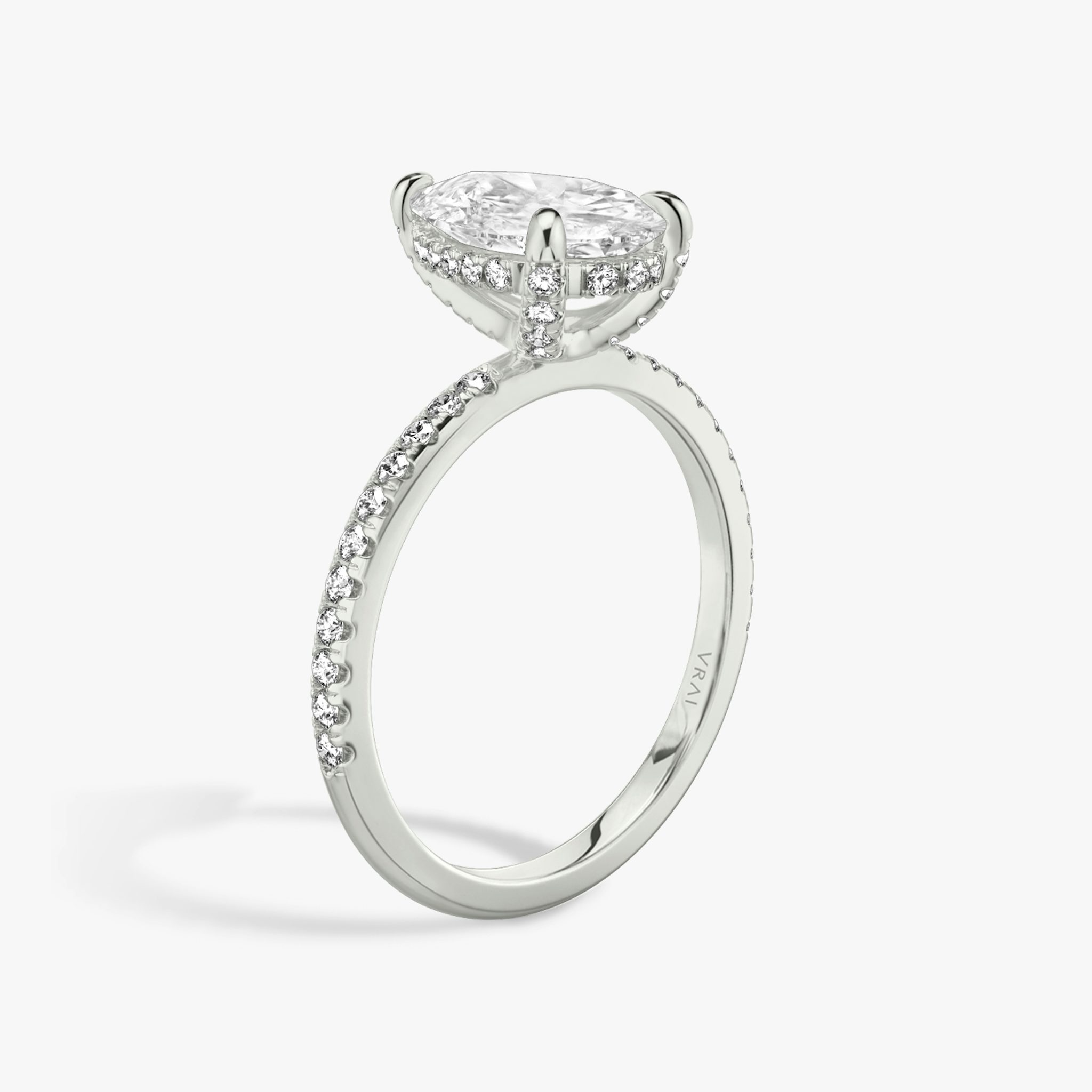 The Classic Hidden Halo | Pear | 18k | White Gold | bandAccent: Pavé | bandWidth: standard | prongStyle: Pavé | diamondOrientation: vertical | caratWeight: other