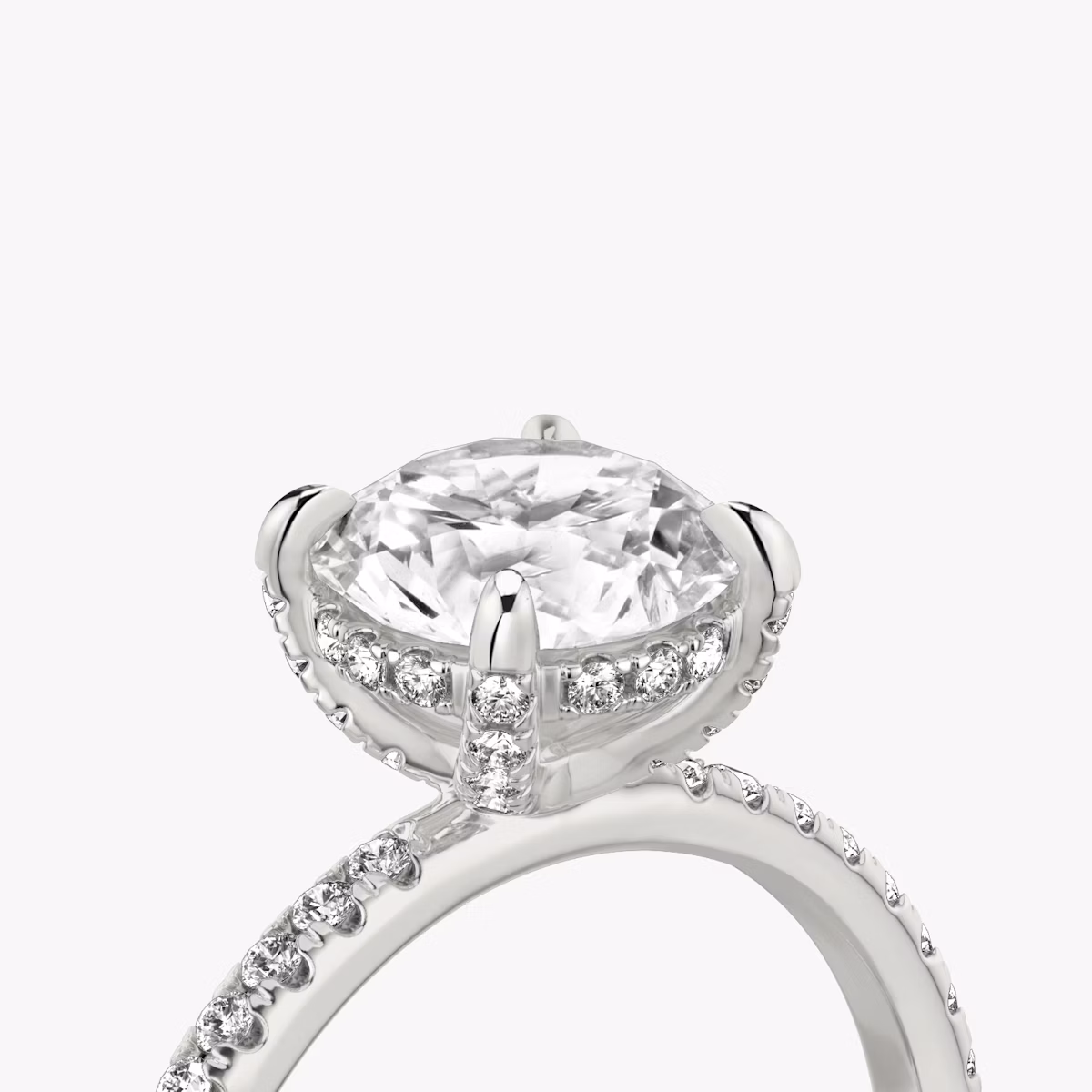 The Classic Hidden Halo | Round Brilliant | 18k | White Gold | bandAccent: Pavé | bandWidth: standard | caratWeight: 1.5ct | prongStyle: Pavé | diamondOrientation: vertical