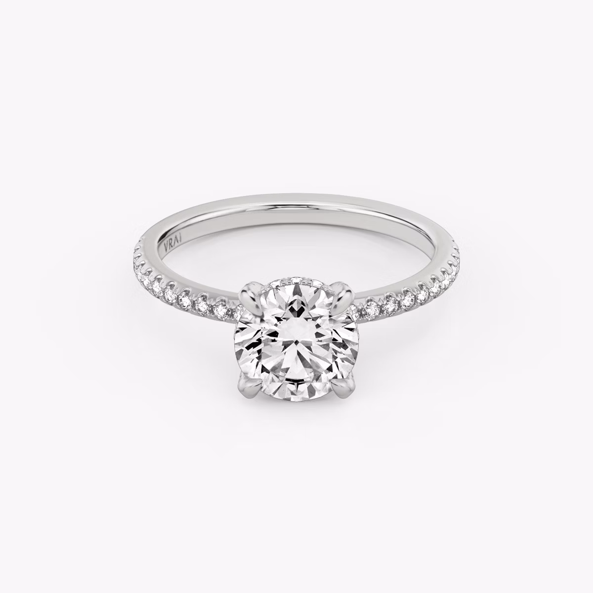 The Classic Hidden Halo | Round Brilliant | 18k | White Gold | bandAccent: Pavé | bandWidth: standard | caratWeight: 1.5ct | prongStyle: Pavé | diamondOrientation: vertical