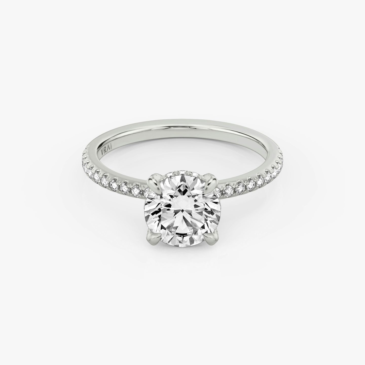 The Classic Hidden Halo | Round Brilliant | 18k | White Gold | bandAccent: Pavé | bandWidth: standard | caratWeight: 1.5ct | prongStyle: Pavé | diamondOrientation: vertical