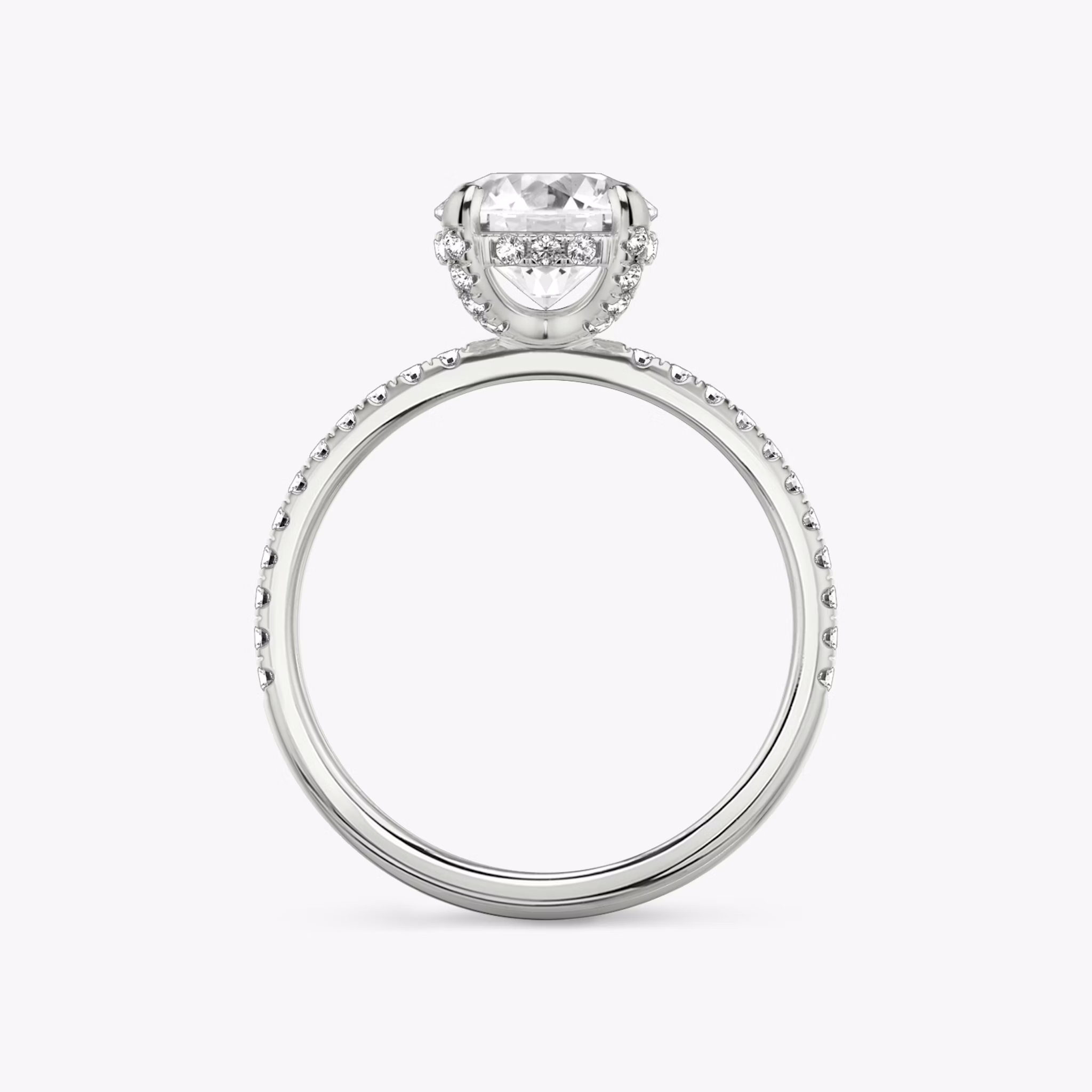 The Classic Hidden Halo | Round Brilliant | 18k | White Gold | bandAccent: Pavé | bandWidth: standard | caratWeight: other | prongStyle: Pavé | diamondOrientation: vertical