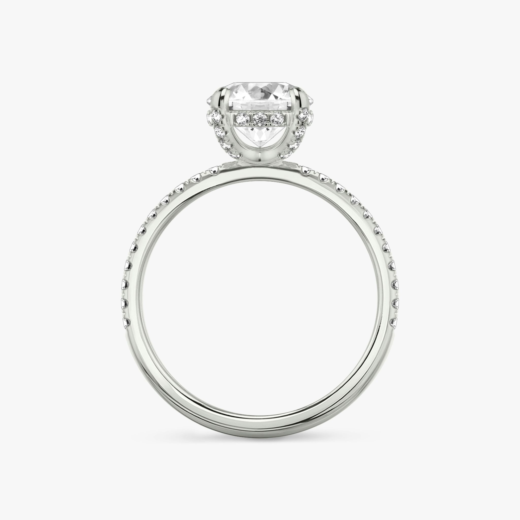 The Classic Hidden Halo | Round Brilliant | 18k | White Gold | bandAccent: Pavé | bandWidth: standard | caratWeight: other | prongStyle: Pavé | diamondOrientation: vertical