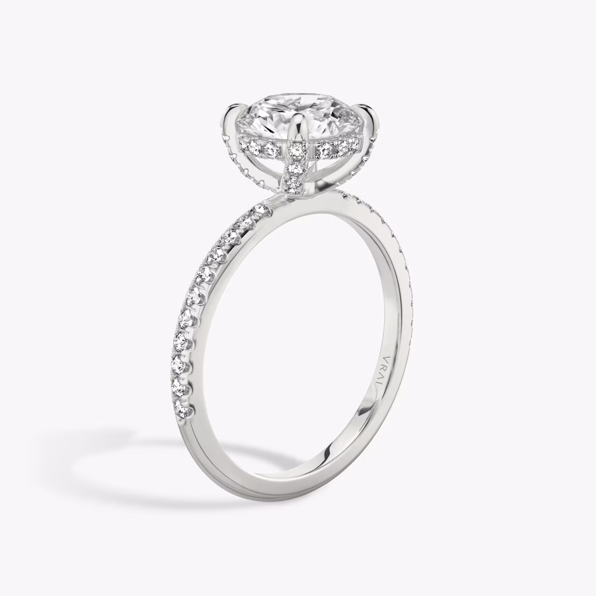 The Classic Hidden Halo | Round Brilliant | 18k | White Gold | bandAccent: Pavé | bandWidth: standard | caratWeight: 1.5ct | prongStyle: Pavé | diamondOrientation: vertical