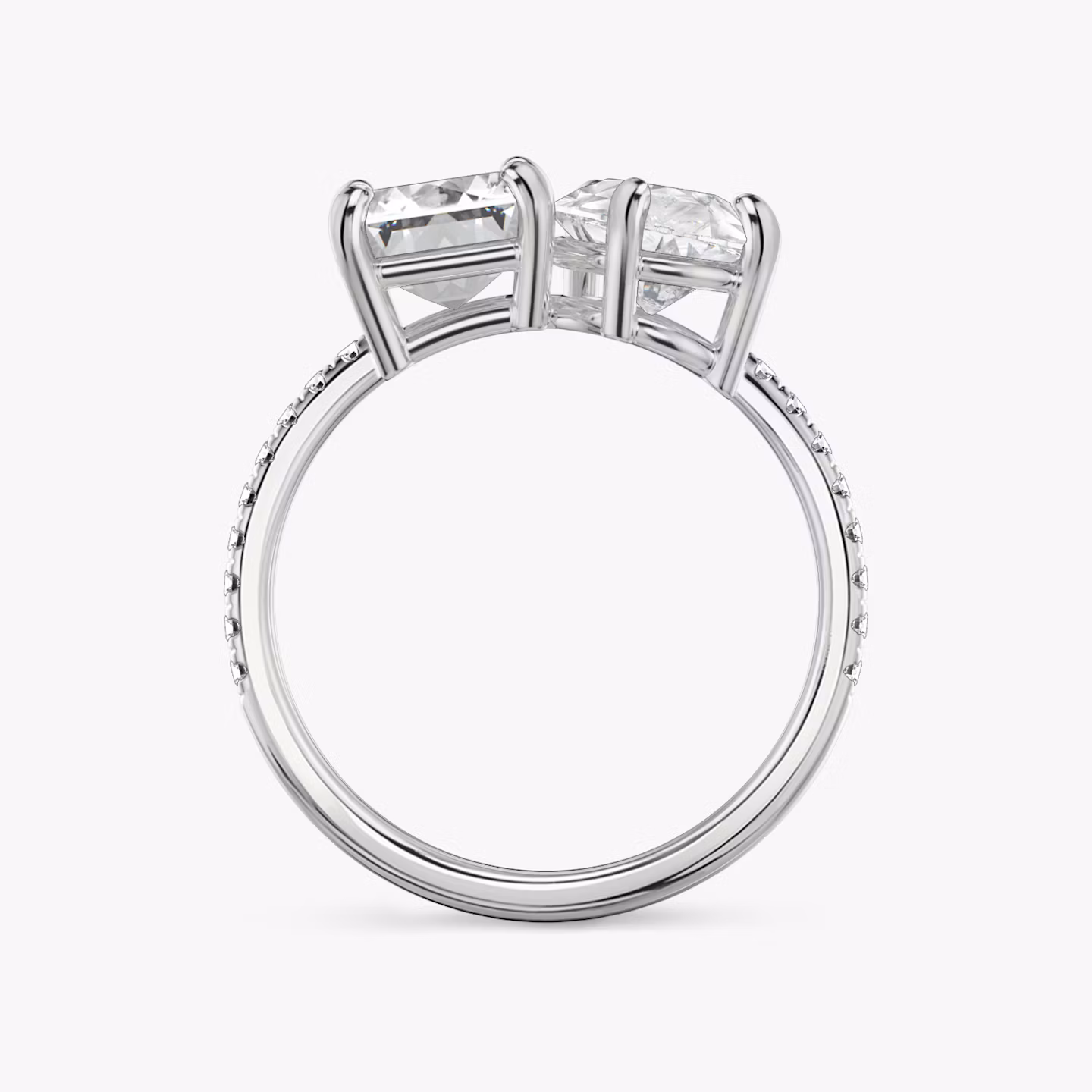 The Toi et Moi | Emerald and Pear | Platinum | bandAccent: Pavé | diamondOrientation: vertical | caratWeight: other