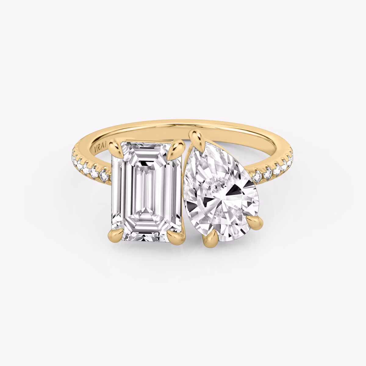 The Toi et Moi | Emerald and Pear | 18k | Yellow Gold | bandAccent: Pavé | diamondOrientation: vertical | caratWeight: other