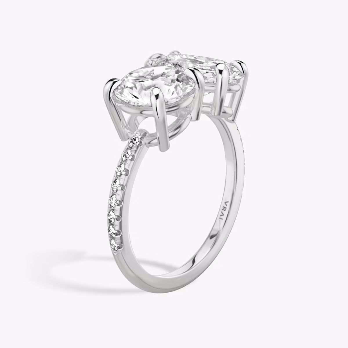 The Toi et Moi | Round Brilliant and Oval | 18k | White Gold | bandAccent: Pavé | diamondOrientation: vertical | caratWeight: other