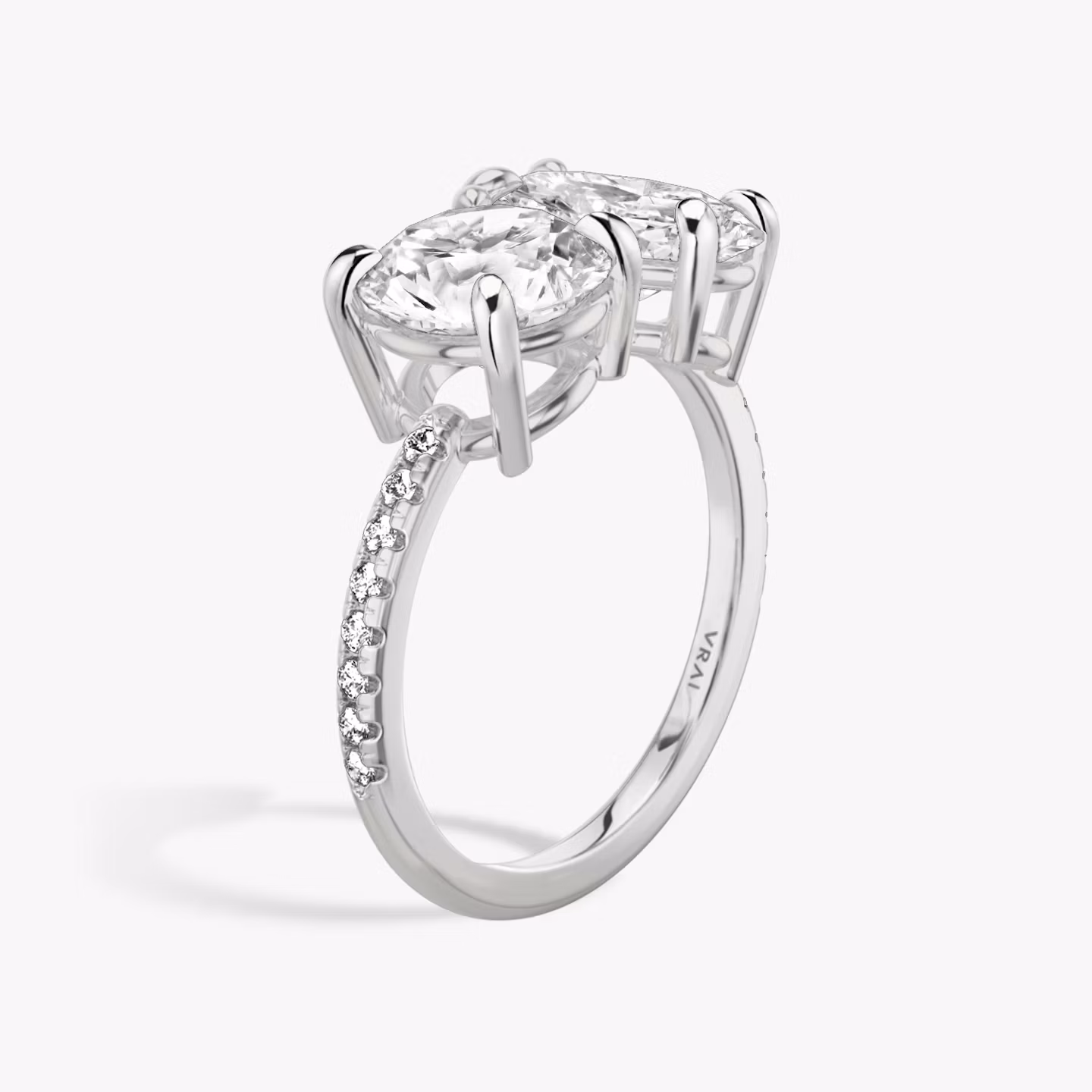 The Toi et Moi | Round Brilliant and Oval | Platinum | bandAccent: Pavé | diamondOrientation: vertical | caratWeight: other