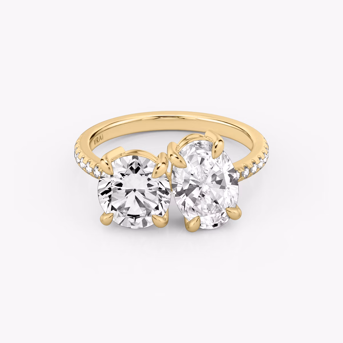 The Toi et Moi | Round Brilliant and Oval | 18k | Yellow Gold | bandAccent: Pavé | diamondOrientation: vertical | caratWeight: other