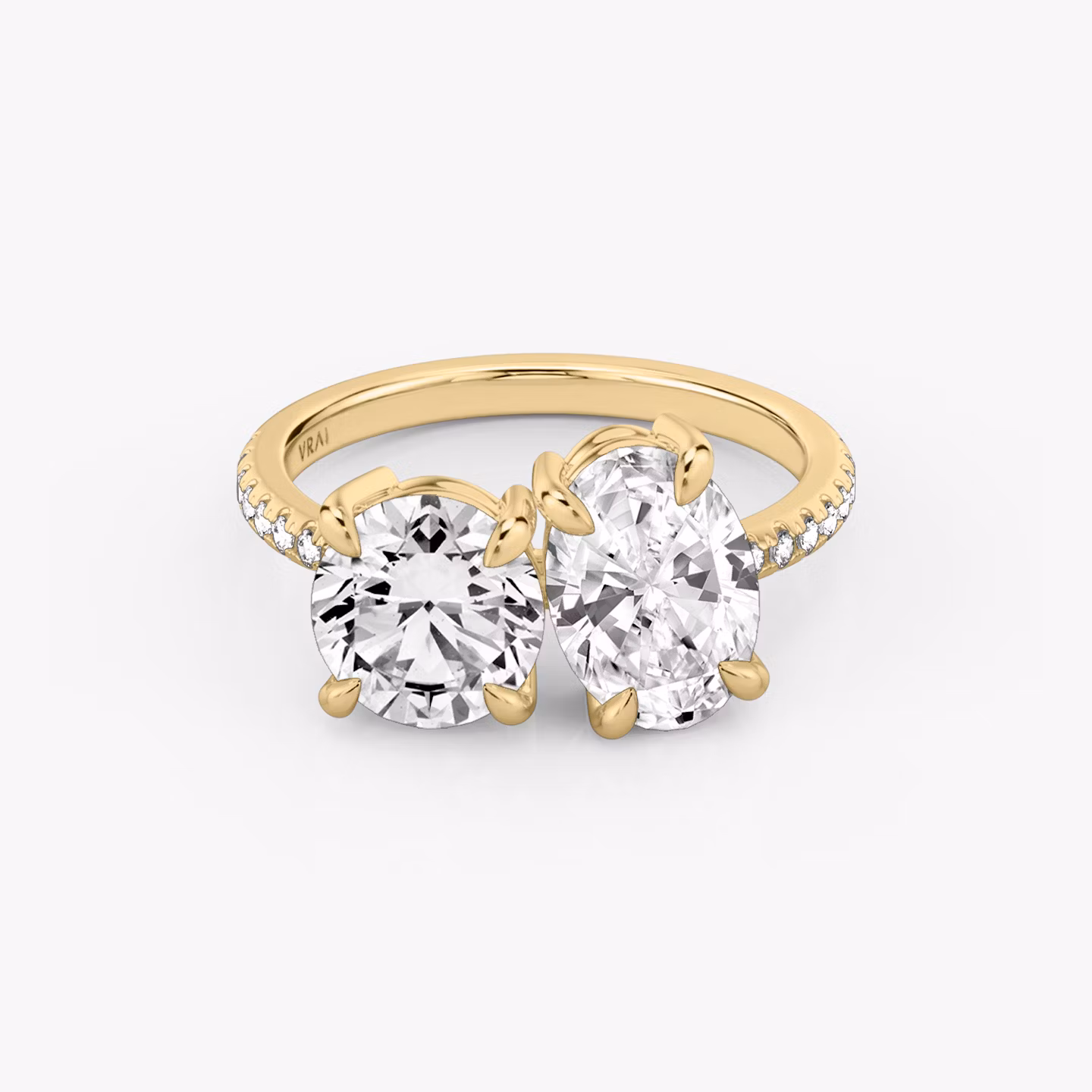 The Toi et Moi | Round Brilliant and Oval | 18k | Yellow Gold | bandAccent: Pavé | diamondOrientation: vertical | caratWeight: other