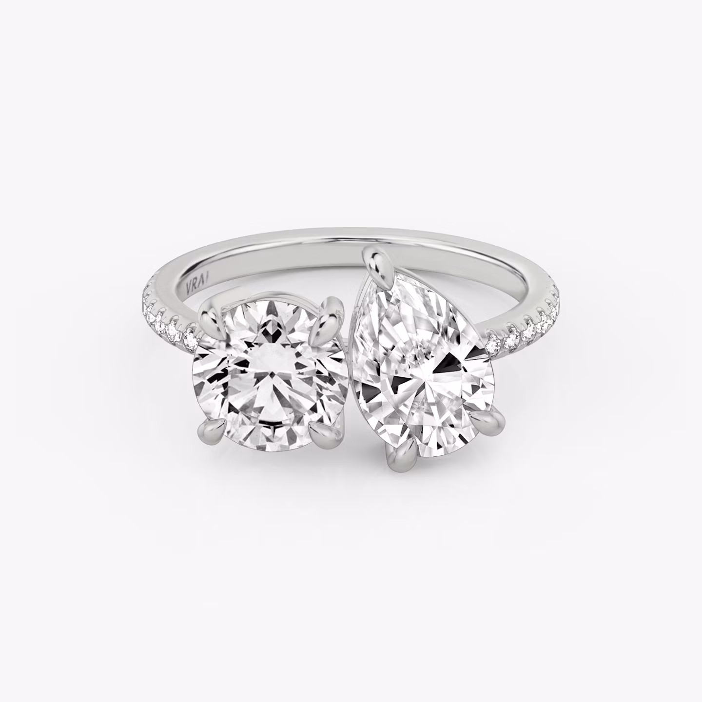 The Toi et Moi | Round Brilliant and Pear | 18k | White Gold | bandAccent: Pavé | diamondOrientation: vertical | caratWeight: other