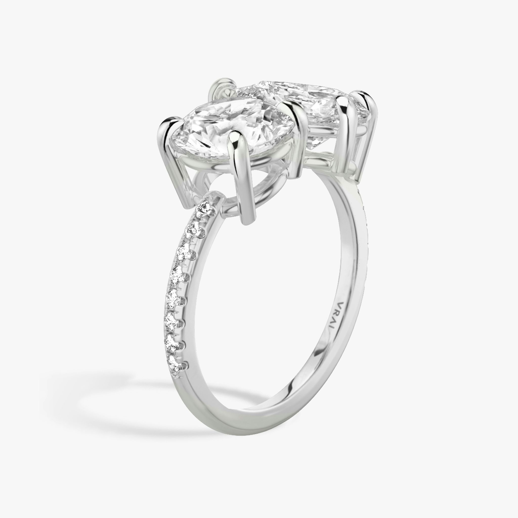 The Toi et Moi | Round Brilliant and Pear | Platinum | bandAccent: Pavé | diamondOrientation: vertical | caratWeight: other