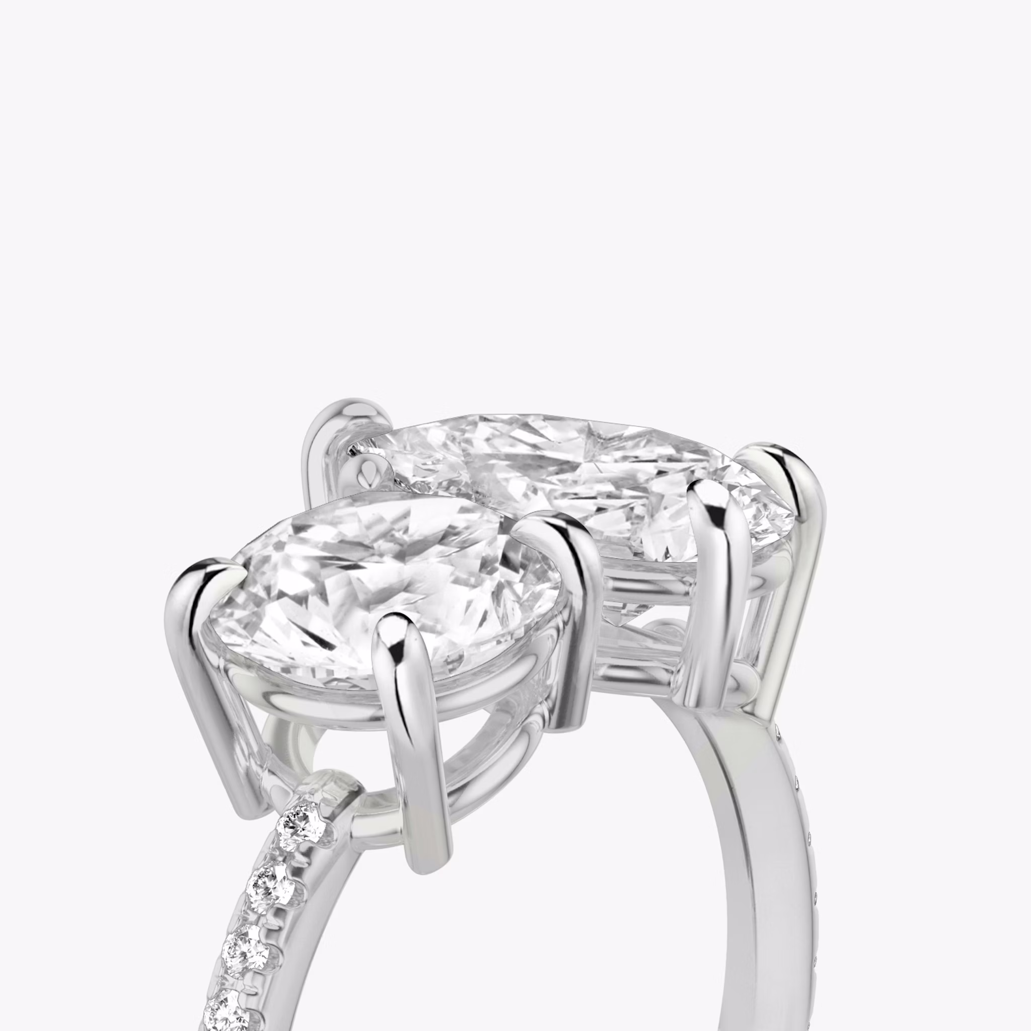 The Toi et Moi | Round Brilliant and Pear | Platinum | bandAccent: Pavé | diamondOrientation: vertical | caratWeight: other