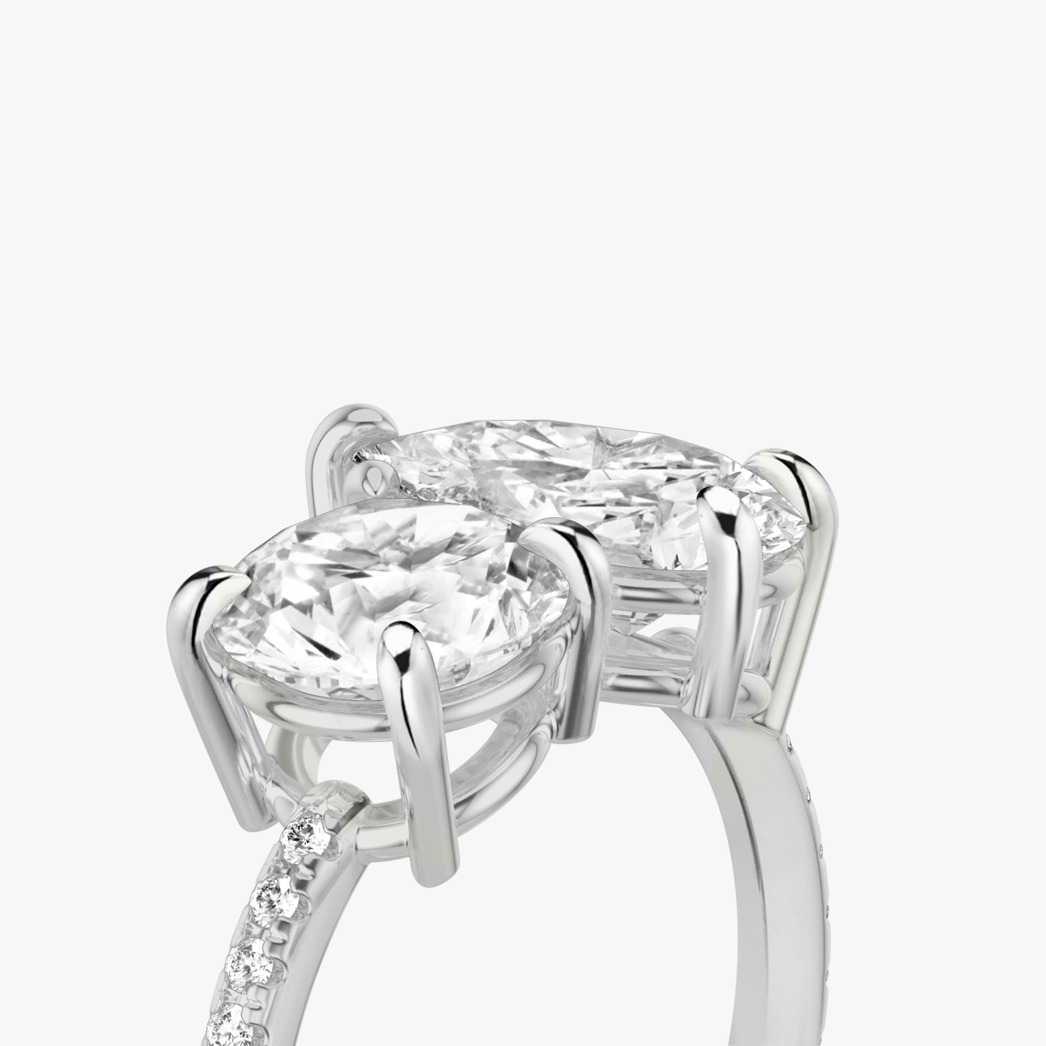 The Toi et Moi | Round Brilliant and Pear | Platinum | bandAccent: Pavé | diamondOrientation: vertical | caratWeight: other