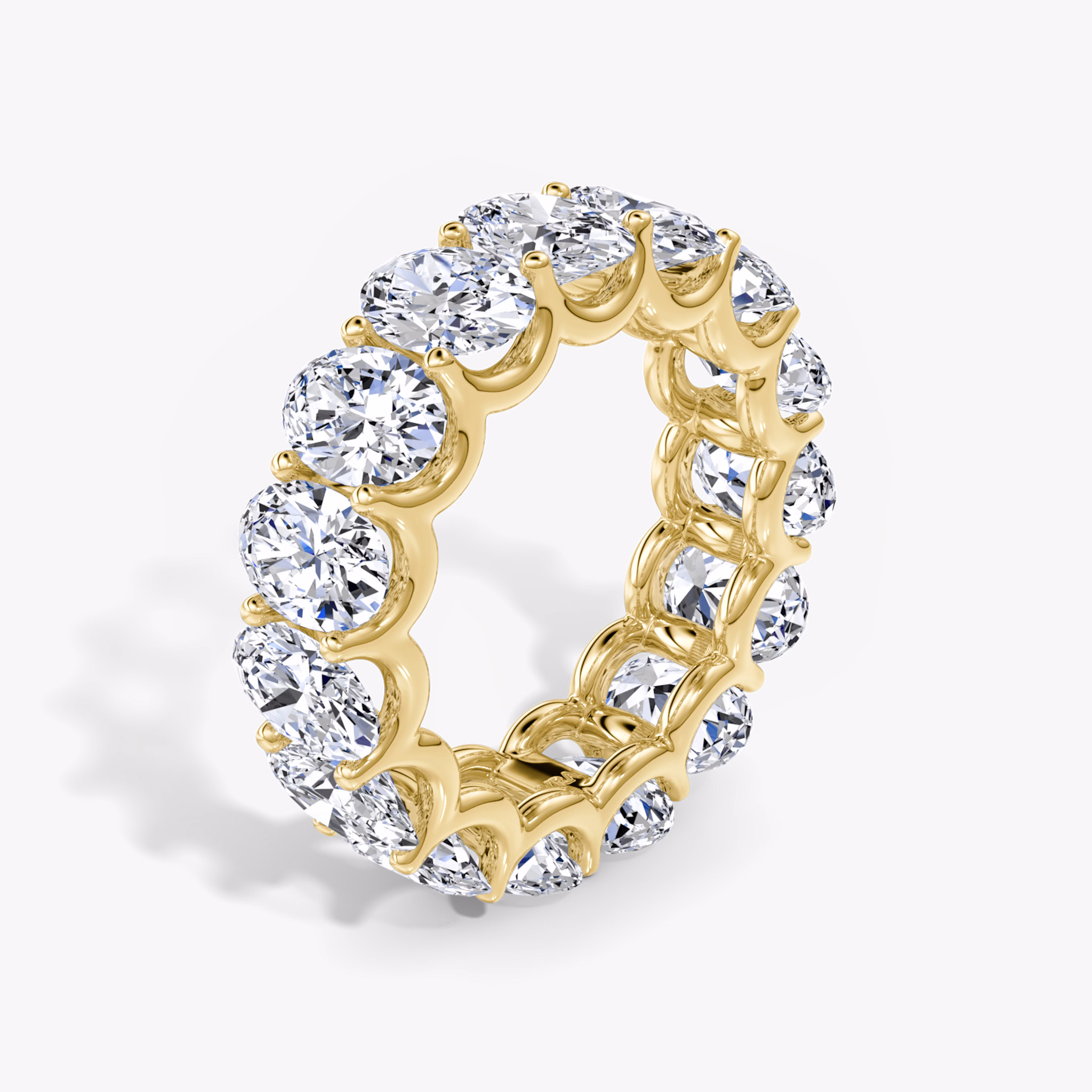 Oval diamond yellow gold eternity ring