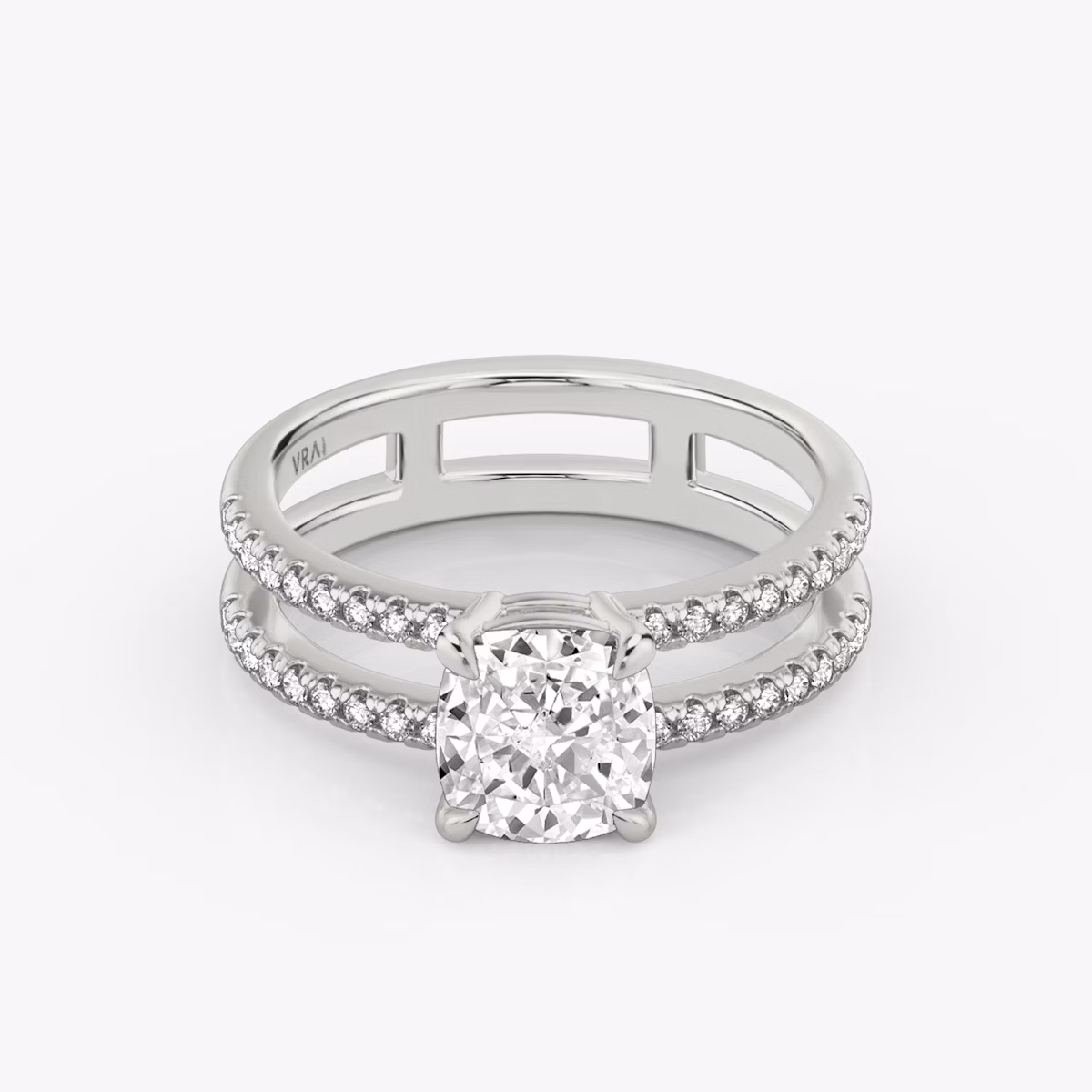 The Double Band | Cushion | Platinum | bandAccent: Pavé | bandStoneShape: Round Brilliant | diamondOrientation: vertical | caratWeight: other