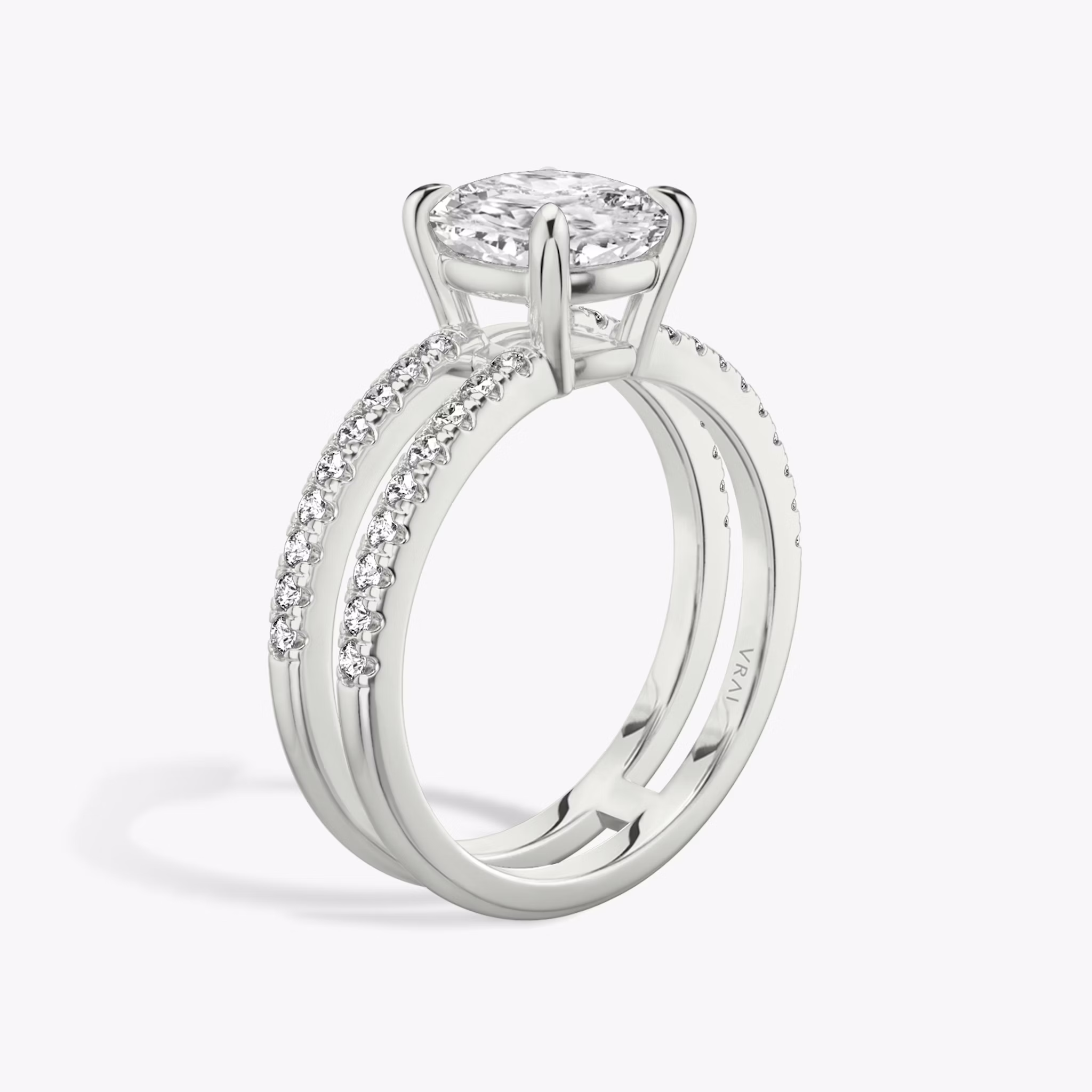 The Double Band | Cushion | Platinum | bandAccent: Pavé | bandStoneShape: Round Brilliant | diamondOrientation: vertical | caratWeight: other
