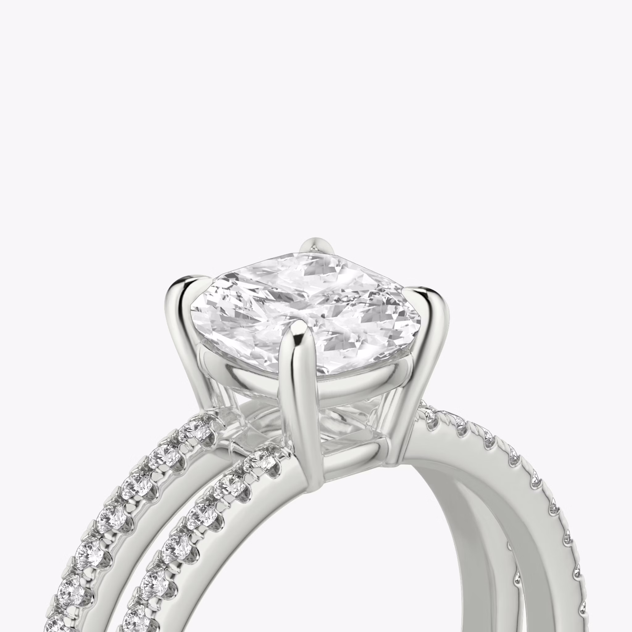 The Double Band | Cushion | Platinum | bandAccent: Pavé | bandStoneShape: Round Brilliant | diamondOrientation: vertical | caratWeight: other