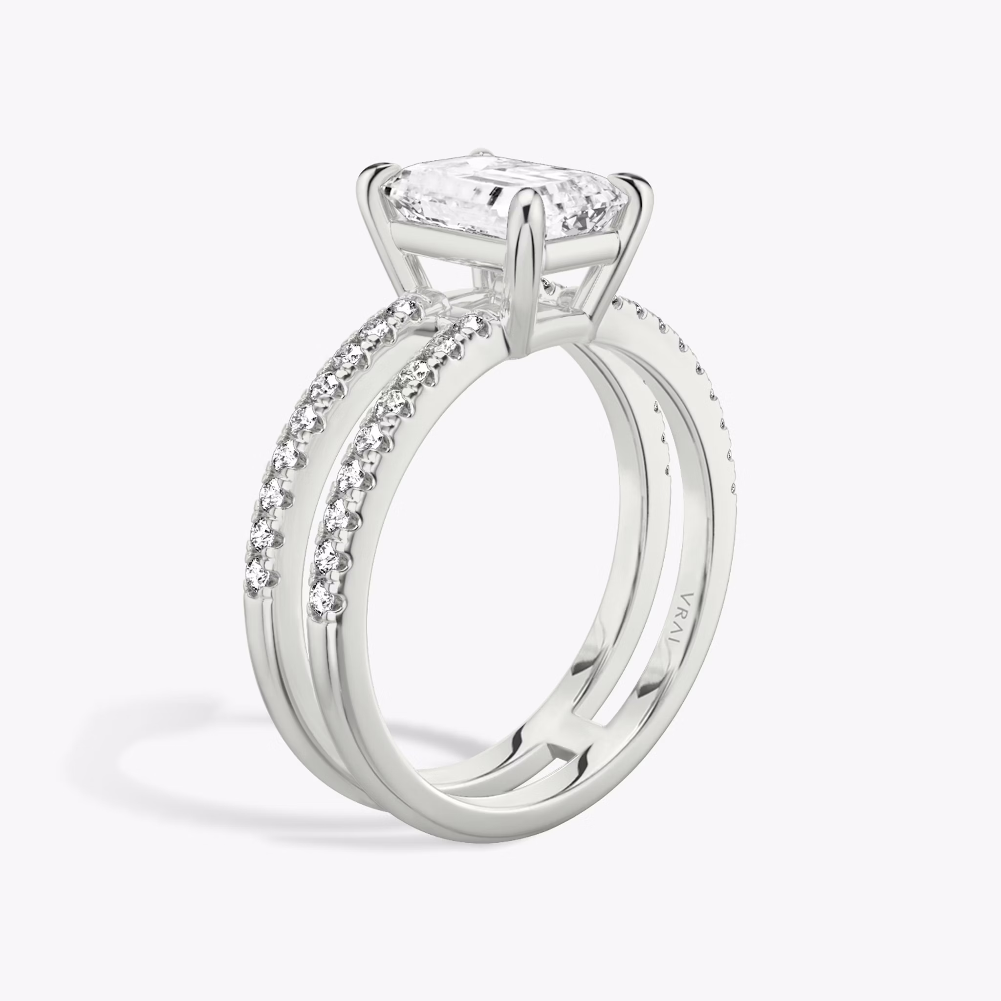 The Double Band | Emerald | 18k | White Gold | bandAccent: Pavé | bandStoneShape: Round Brilliant | diamondOrientation: vertical | caratWeight: other
