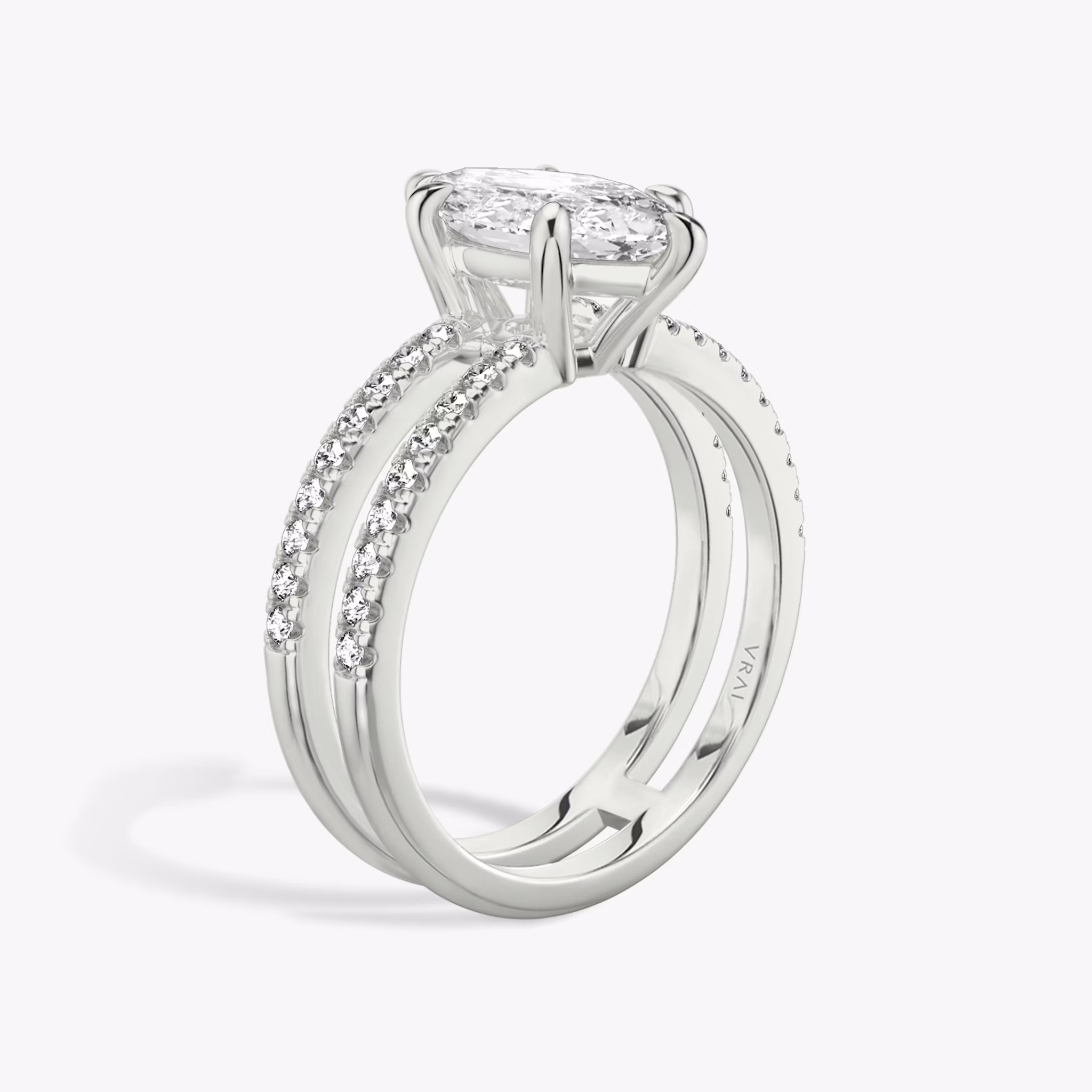 The Double Band | Marquise | Platinum | bandAccent: Pavé | bandStoneShape: Round Brilliant | diamondOrientation: vertical | caratWeight: other