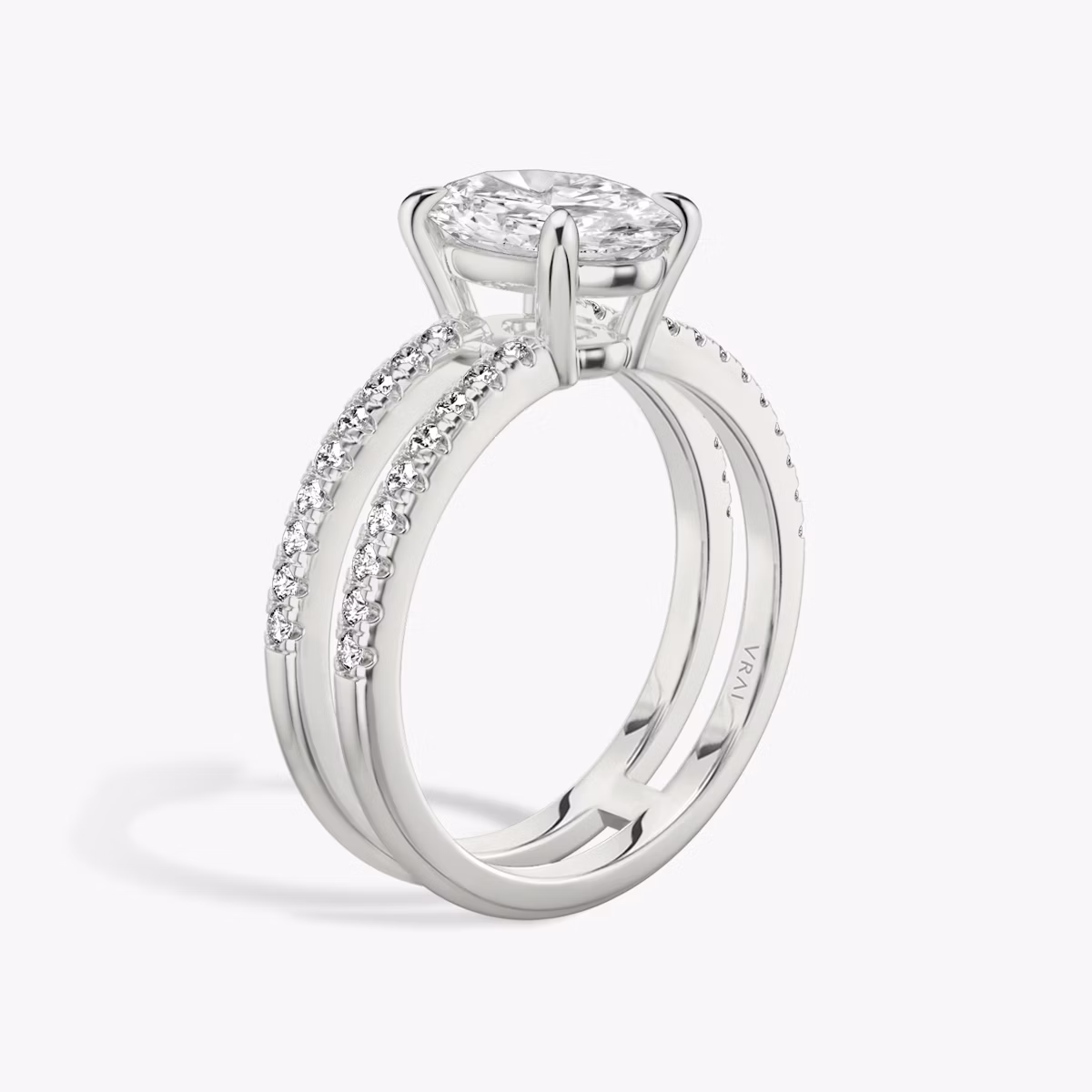 The Double Band | Oval | Platinum | bandAccent: Pavé | bandStoneShape: Round Brilliant | diamondOrientation: vertical | caratWeight: other