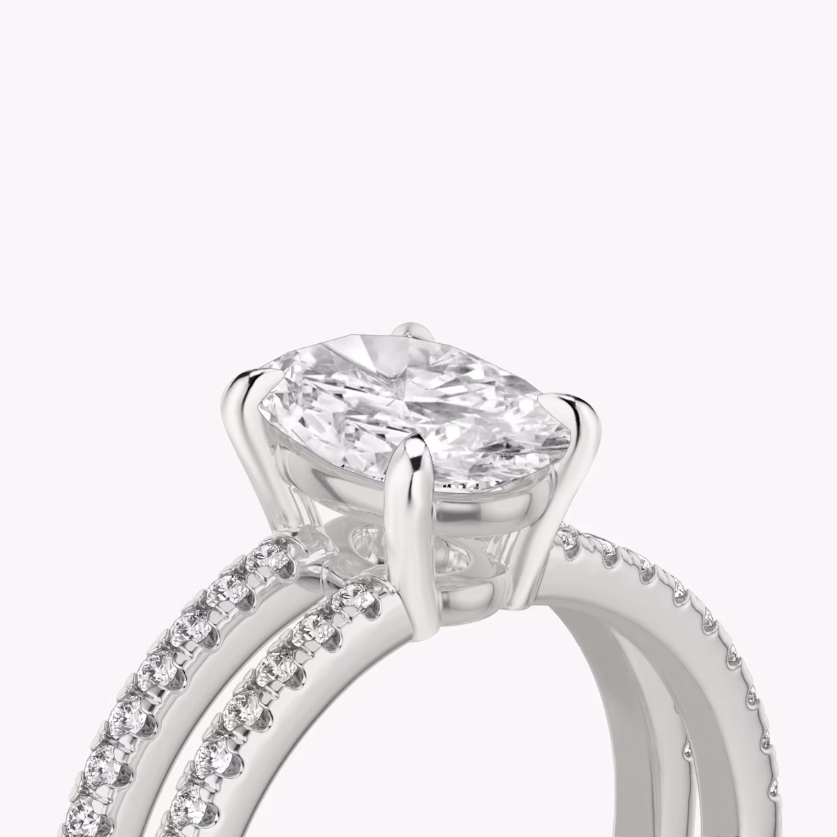 The Double Band | Oval | Platinum | bandAccent: Pavé | bandStoneShape: Round Brilliant | diamondOrientation: vertical | caratWeight: other