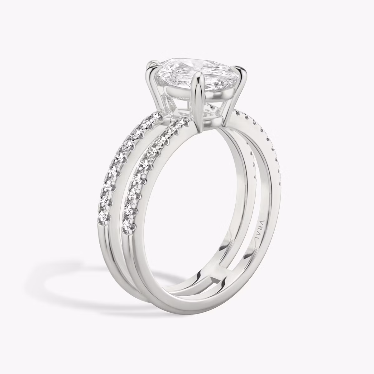 The Double Band | Pear | 18k | White Gold | bandAccent: Pavé | bandStoneShape: Round Brilliant | diamondOrientation: vertical | caratWeight: other