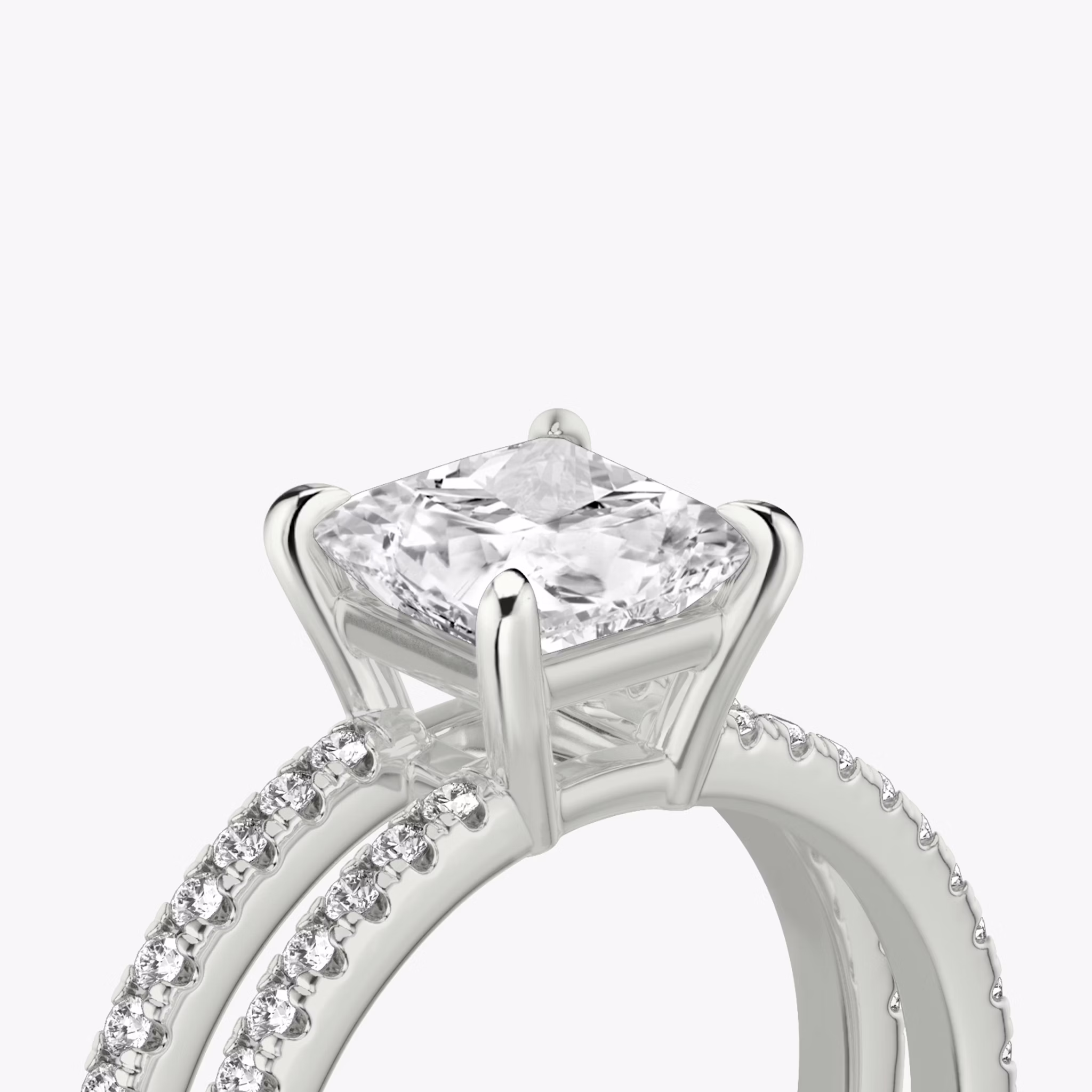 The Double Band | Princess | Platinum | bandAccent: Pavé | bandStoneShape: Round Brilliant | diamondOrientation: vertical | caratWeight: other