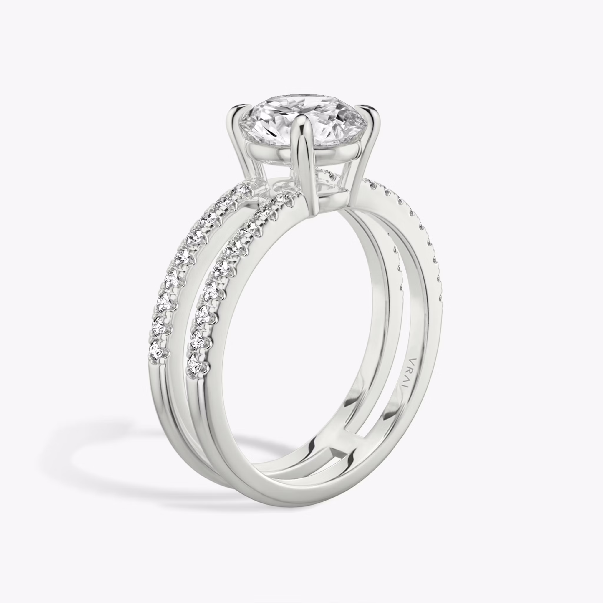 The Double Band | Round Brilliant | Platinum | bandAccent: Pavé | bandStoneShape: Round Brilliant | caratWeight: other | diamondOrientation: vertical