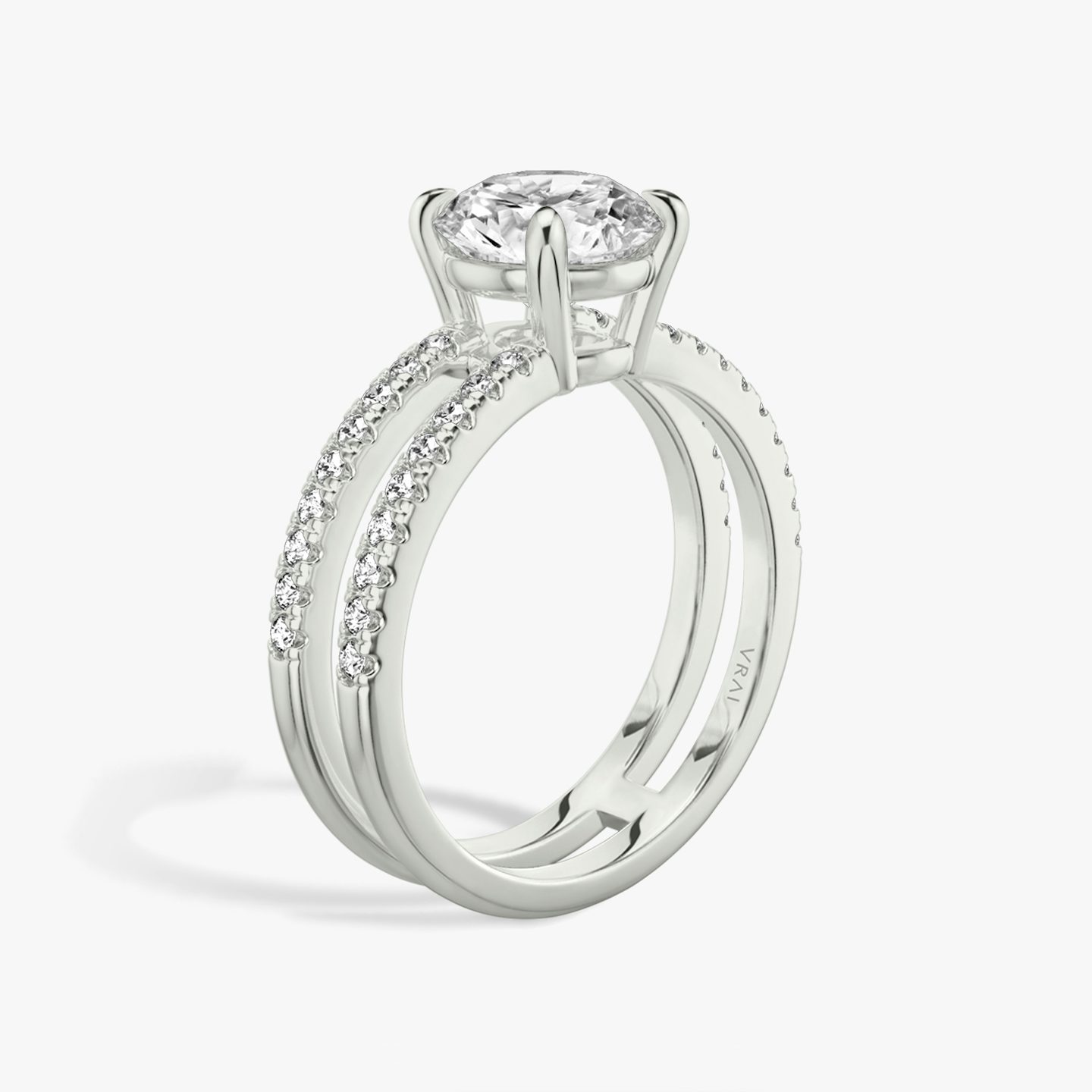 The Double Band | Round Brilliant | Platinum | bandAccent: Pavé | bandStoneShape: Round Brilliant | caratWeight: 1.0ct | diamondOrientation: vertical