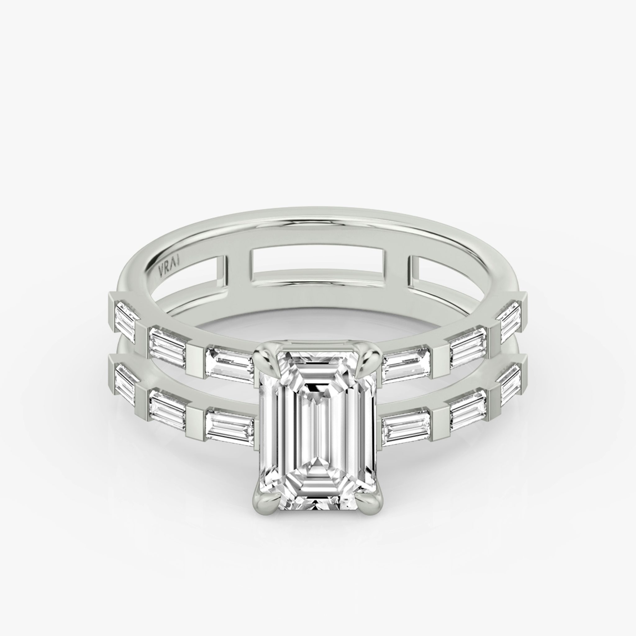 The Double Band | Emerald | Platinum | bandAccent: Pavé | bandStoneShape: Baguette | diamondOrientation: vertical | caratWeight: other