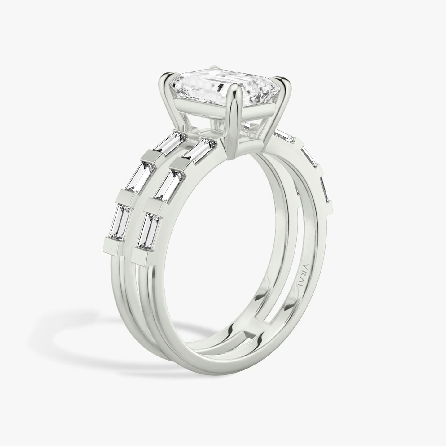 The Double Band | Emerald | Platinum | bandAccent: Pavé | bandStoneShape: Baguette | diamondOrientation: vertical | caratWeight: other
