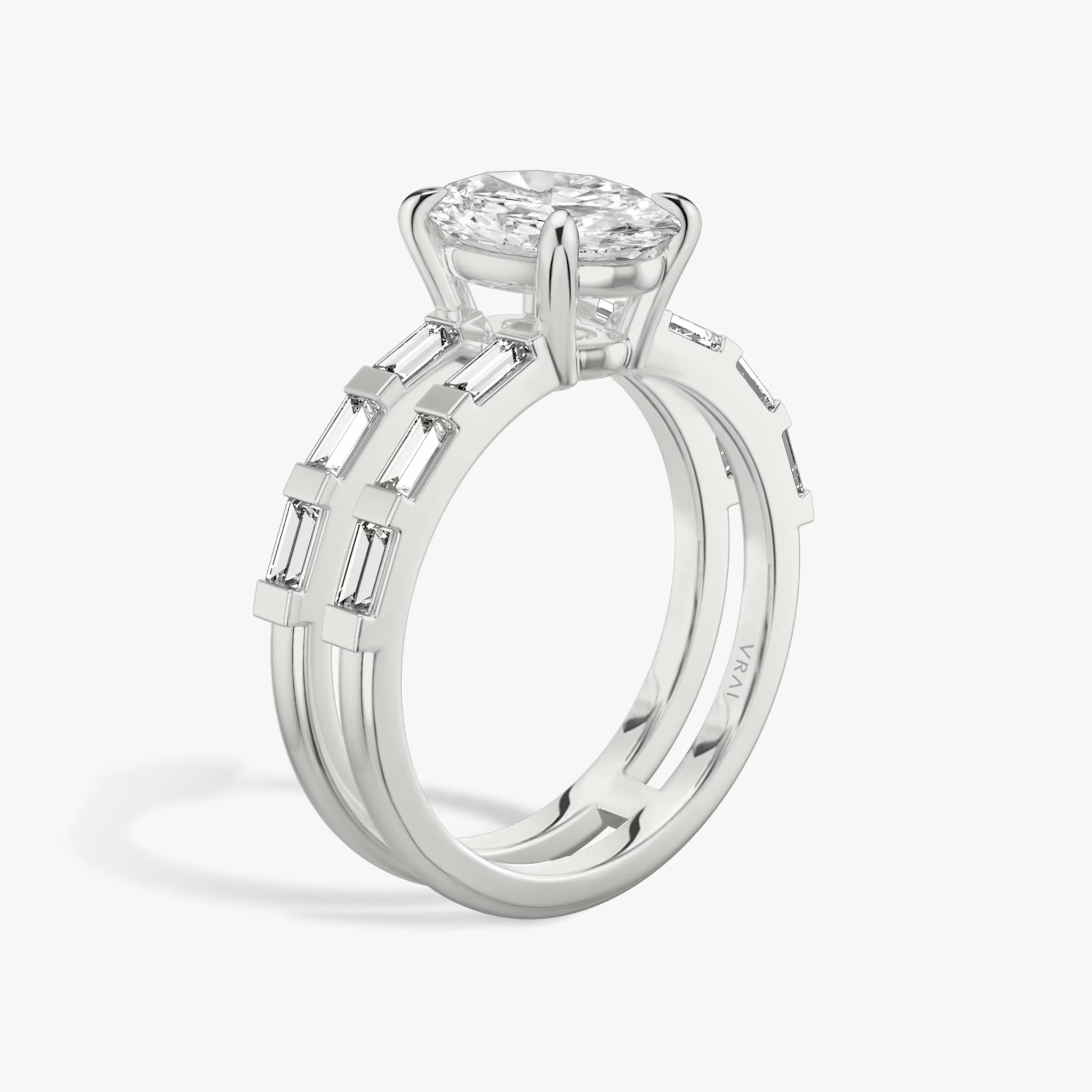 The Double Band | Oval | Platinum | bandAccent: Pavé | bandStoneShape: Baguette | diamondOrientation: vertical | caratWeight: other