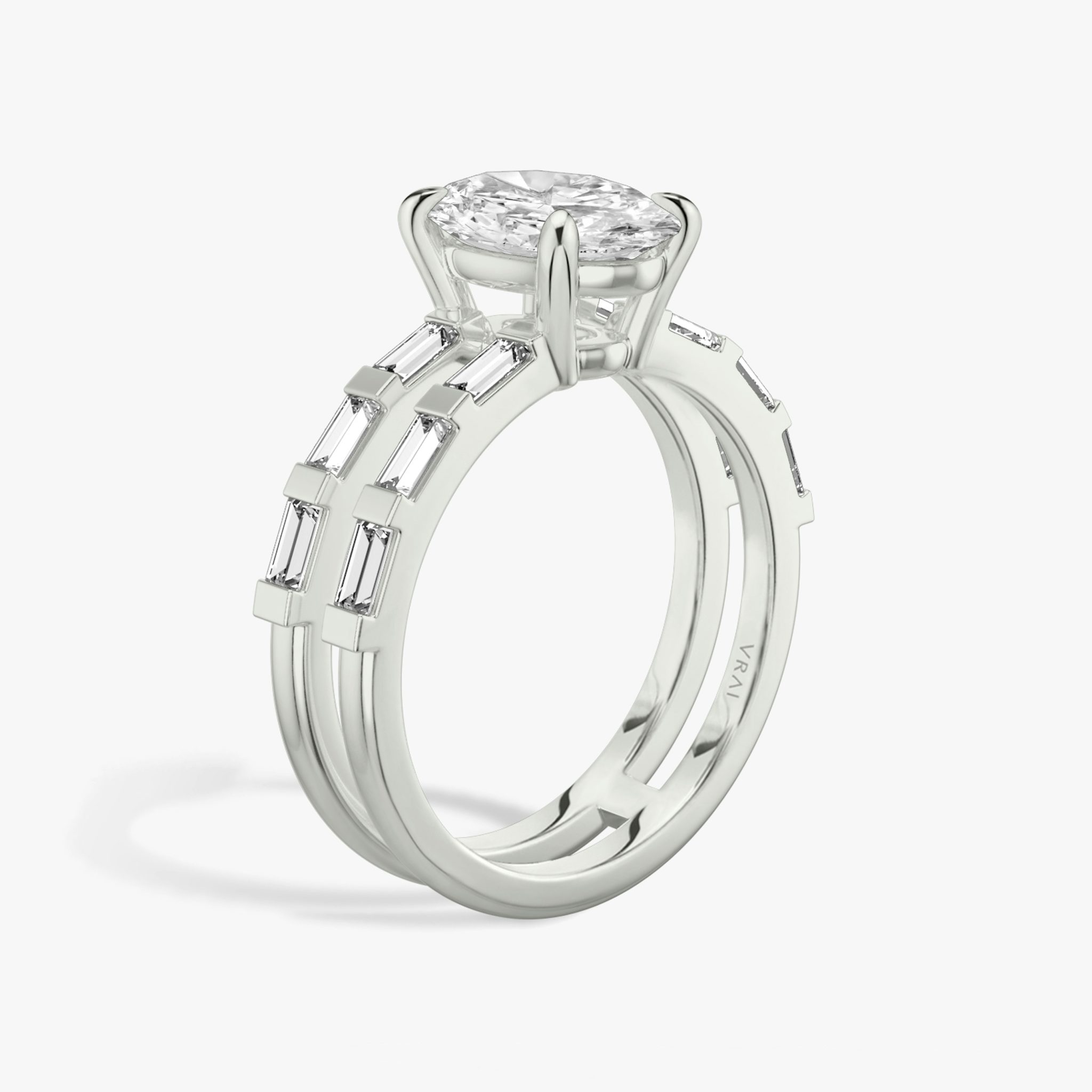 The Double Band | Oval | Platinum | bandAccent: Pavé | bandStoneShape: Baguette | diamondOrientation: vertical | caratWeight: other