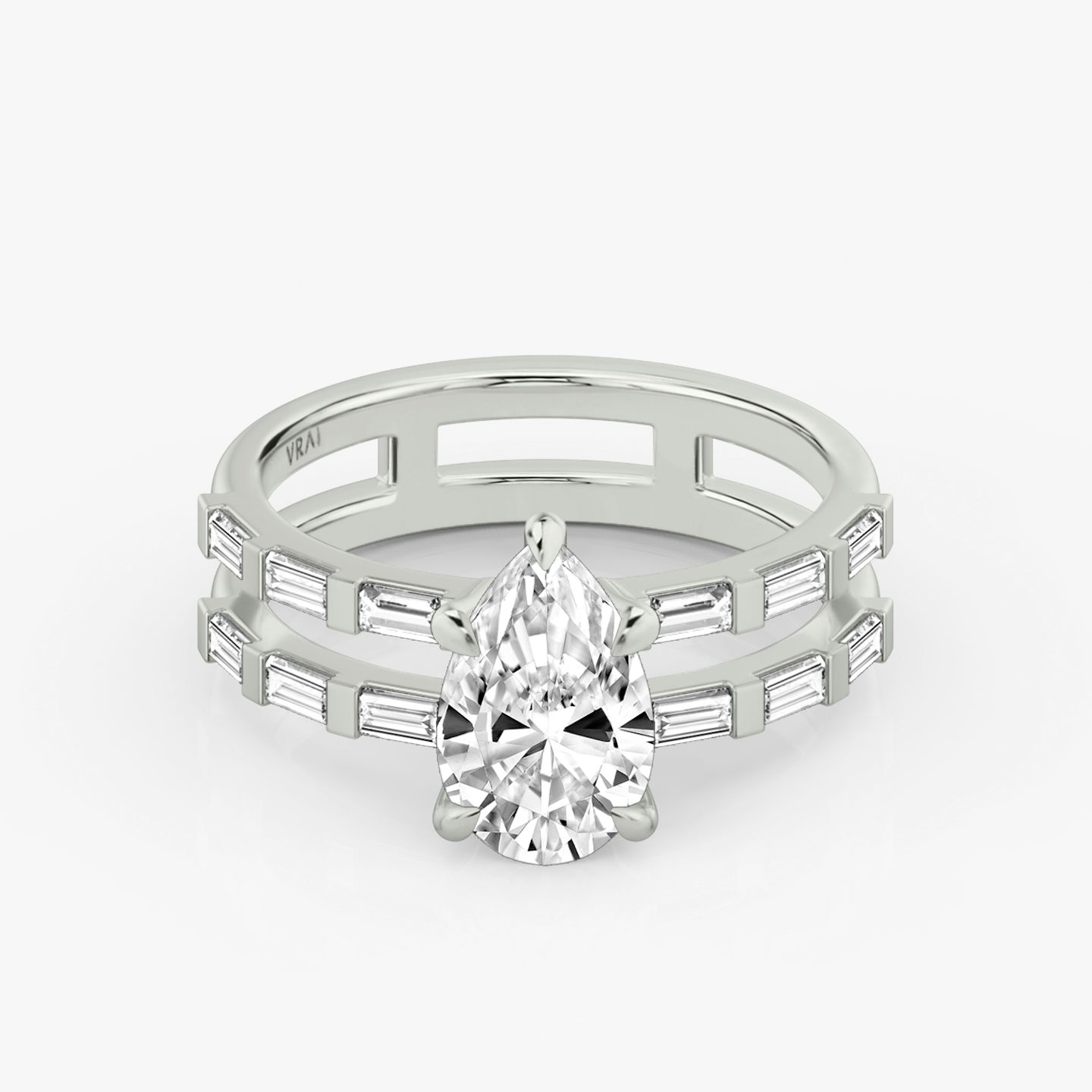 The Double Band | Pear | Platinum | bandAccent: Pavé | bandStoneShape: Baguette | diamondOrientation: vertical | caratWeight: other