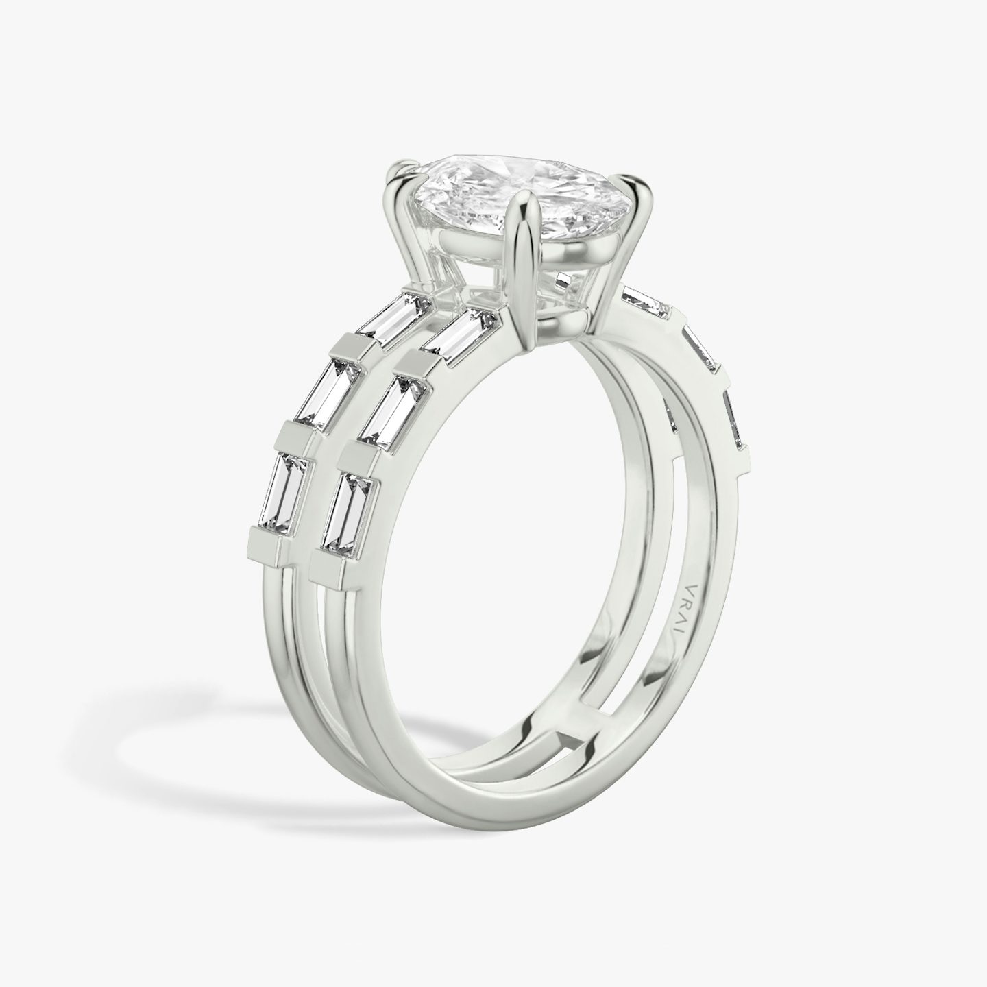 The Double Band | Pear | Platinum | bandAccent: Pavé | bandStoneShape: Baguette | diamondOrientation: vertical | caratWeight: other
