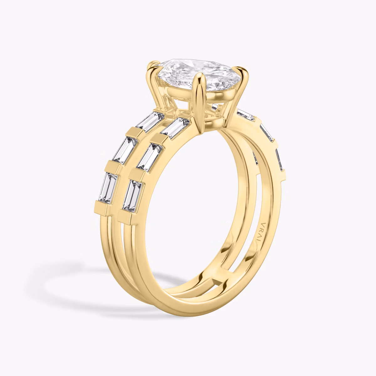 The Double Band | Pear | 18k | Yellow Gold | bandAccent: Pavé | bandStoneShape: Baguette | diamondOrientation: vertical | caratWeight: other